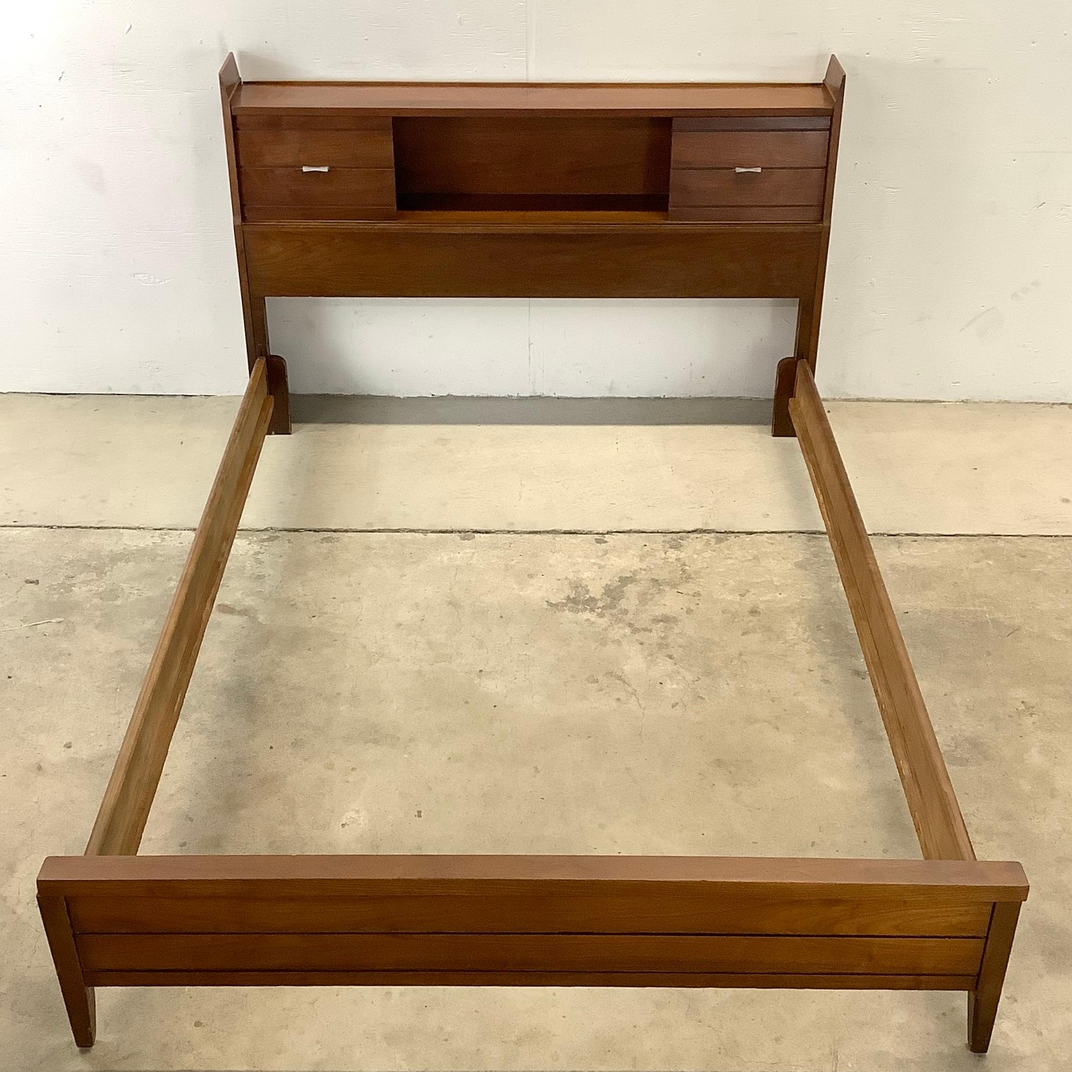This stylish midcentury bed frame features vintage walnut finish with a unique sliding door storage headboard. The detailed mcm design of the bed frame is meant to fit a full Size bed with approximately 57 inches between the side rails. In a style