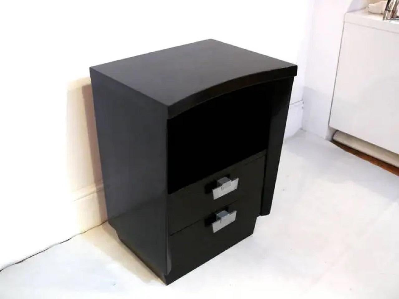 American of Martinsville midcentury ebonized curved front nightstand, side or end table with two drawers and open cubby resting on a floating base. This nightstand is sturdy, eye-catching, and ready to be used for years to come. Overall good
