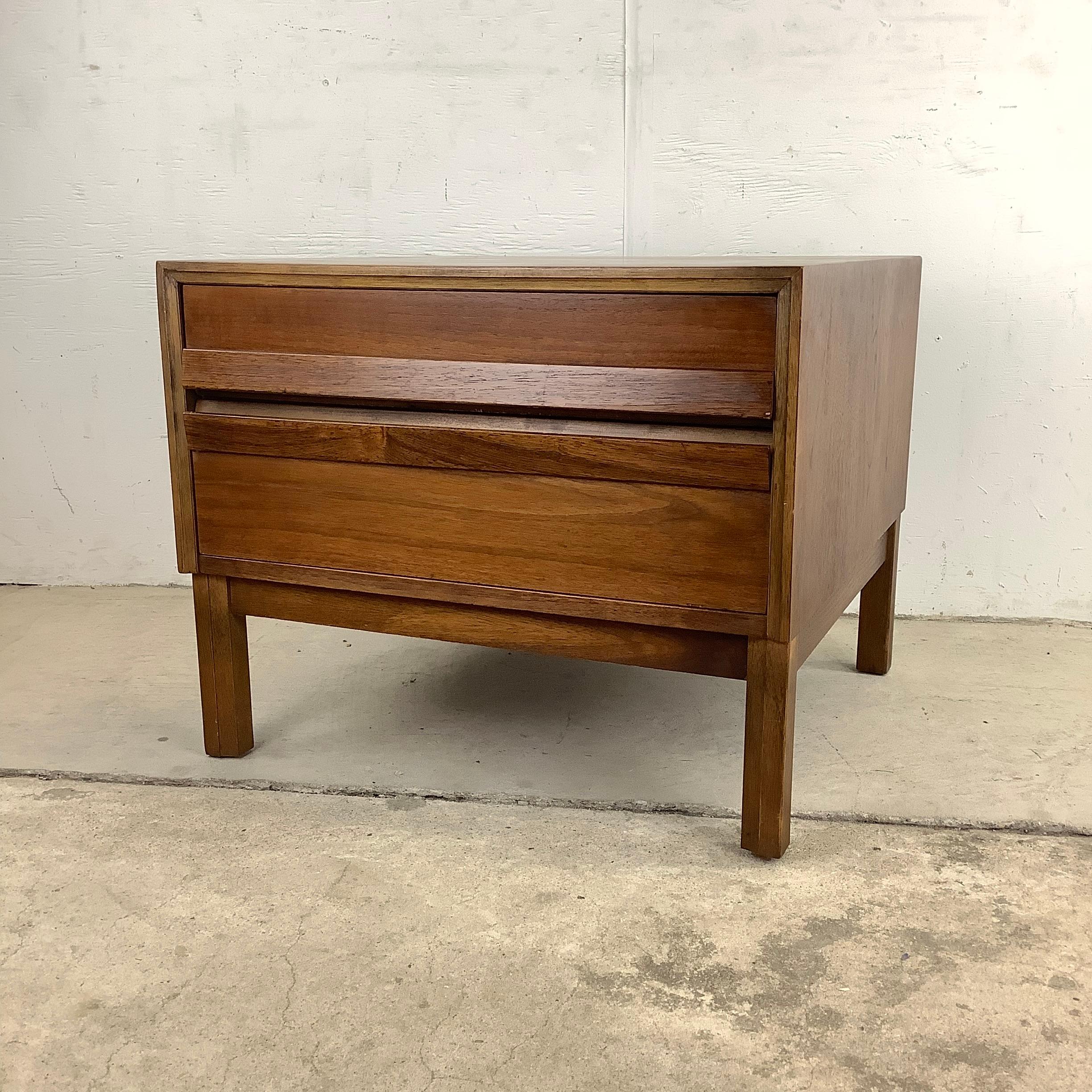 This simple yet stylish Mid-Century Modern Walnut End Table perfectly captures the best aspects of classic mid-century style. Crafted from high-quality vintage walnut, these end tables showcase the natural beauty of the wood grain, exuding warmth