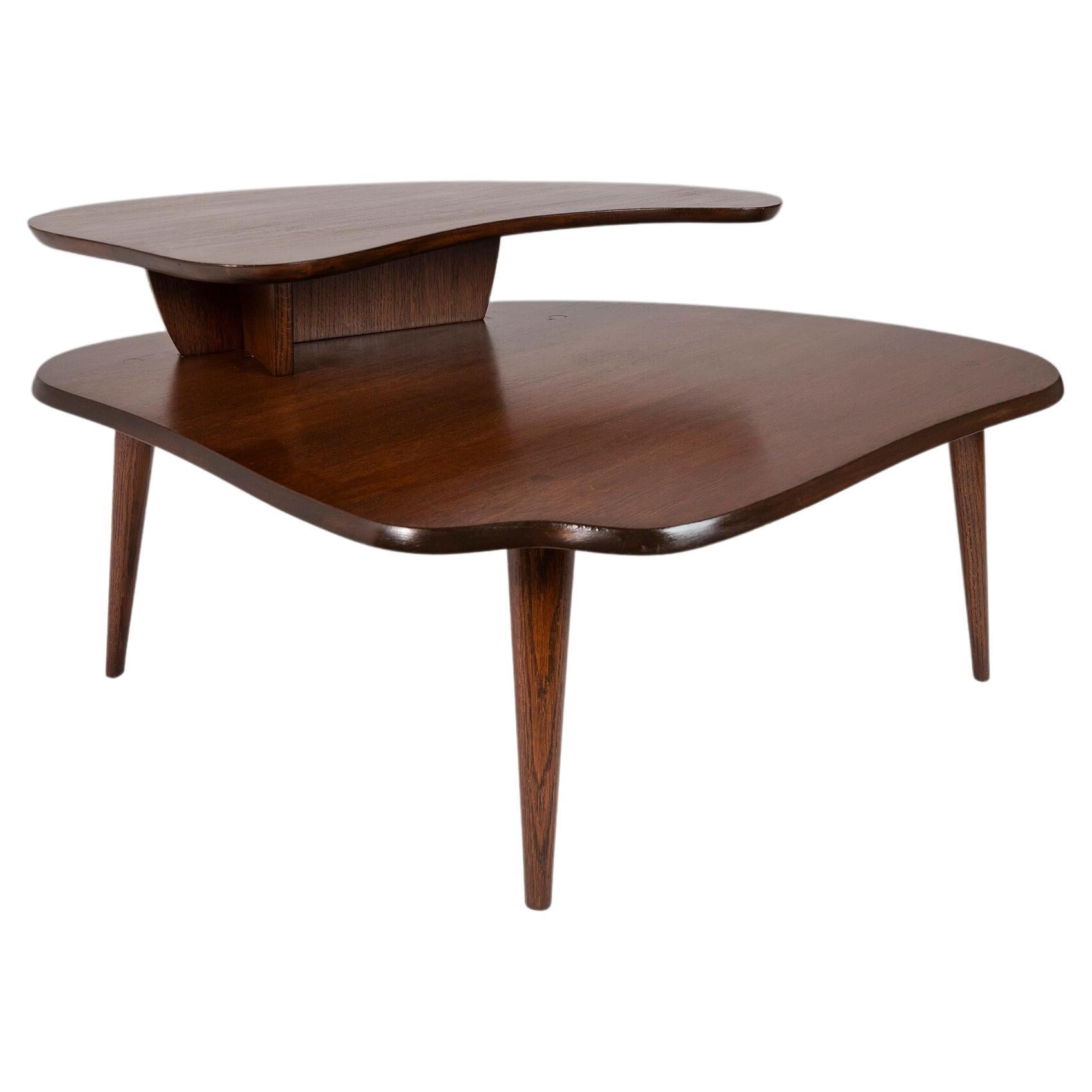 Mid Century Two-Tiered Coffee Table in Oak Stained Walnut after Paul Laszlo For Sale