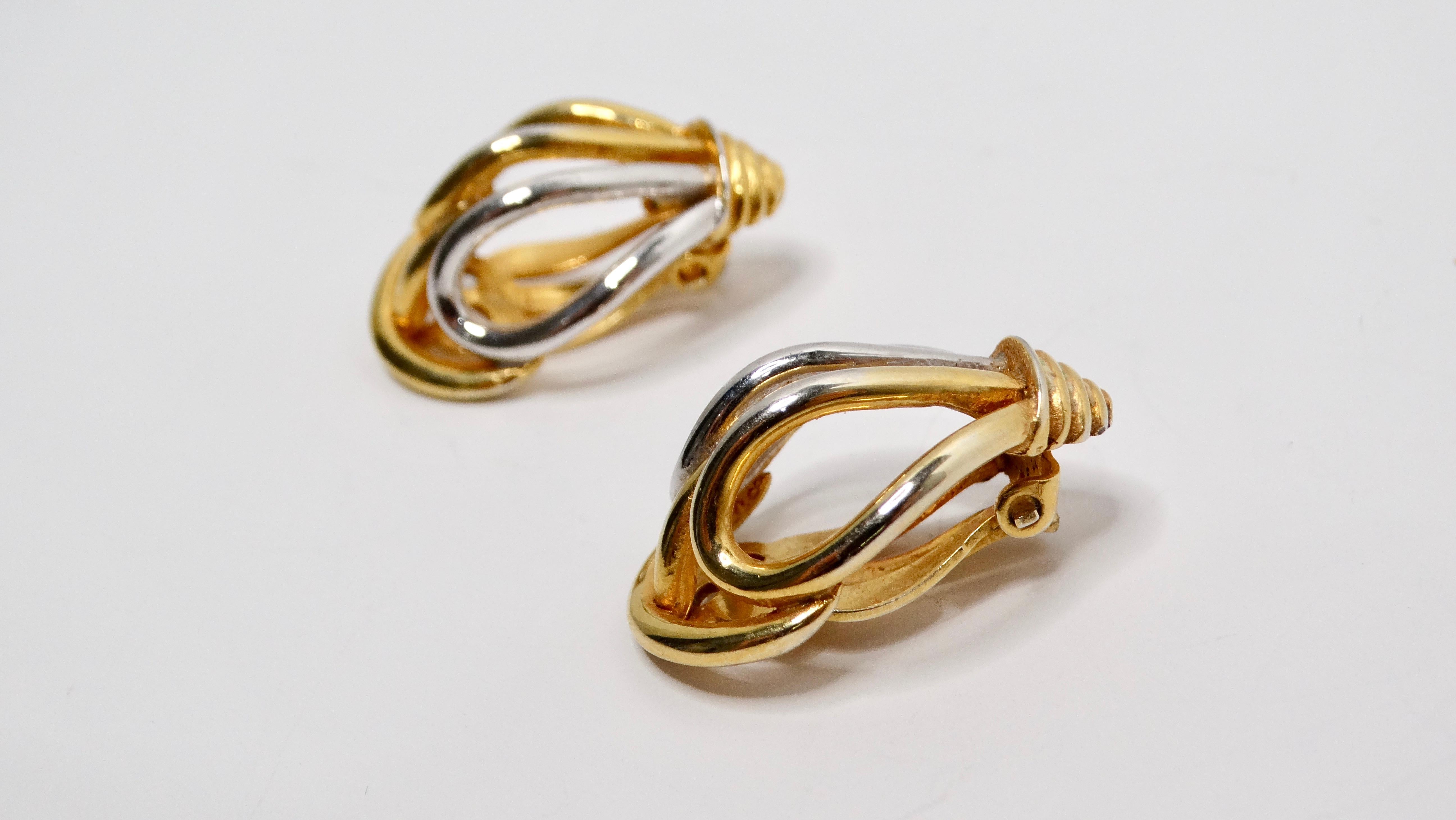 These stunning Mid-Century Two-Toned 18k Gold Plated Clip-On Earrings embody the elegance and sophistication of timeless design. Featuring a unique interplay of sterling silver plated & 18k Gold Plated polished finishes, these earrings capture the