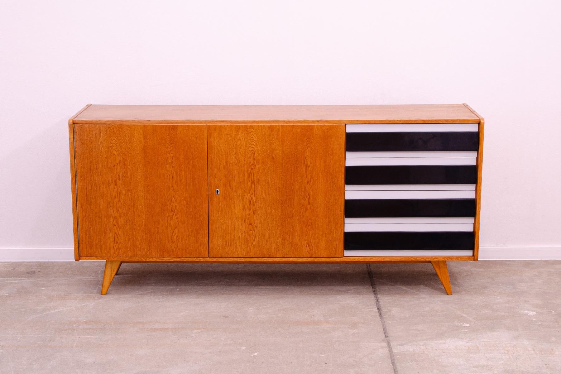 A popular Vintage sideboard model U-460 from the 1960´s. It was designed by Jiri Jiroutek for Interier Praha. It features a beech wood, plywood, colored lacquered drawers. In excellent condition, fully refurbished.

Height: 76 cm, lenght: 165 cm,