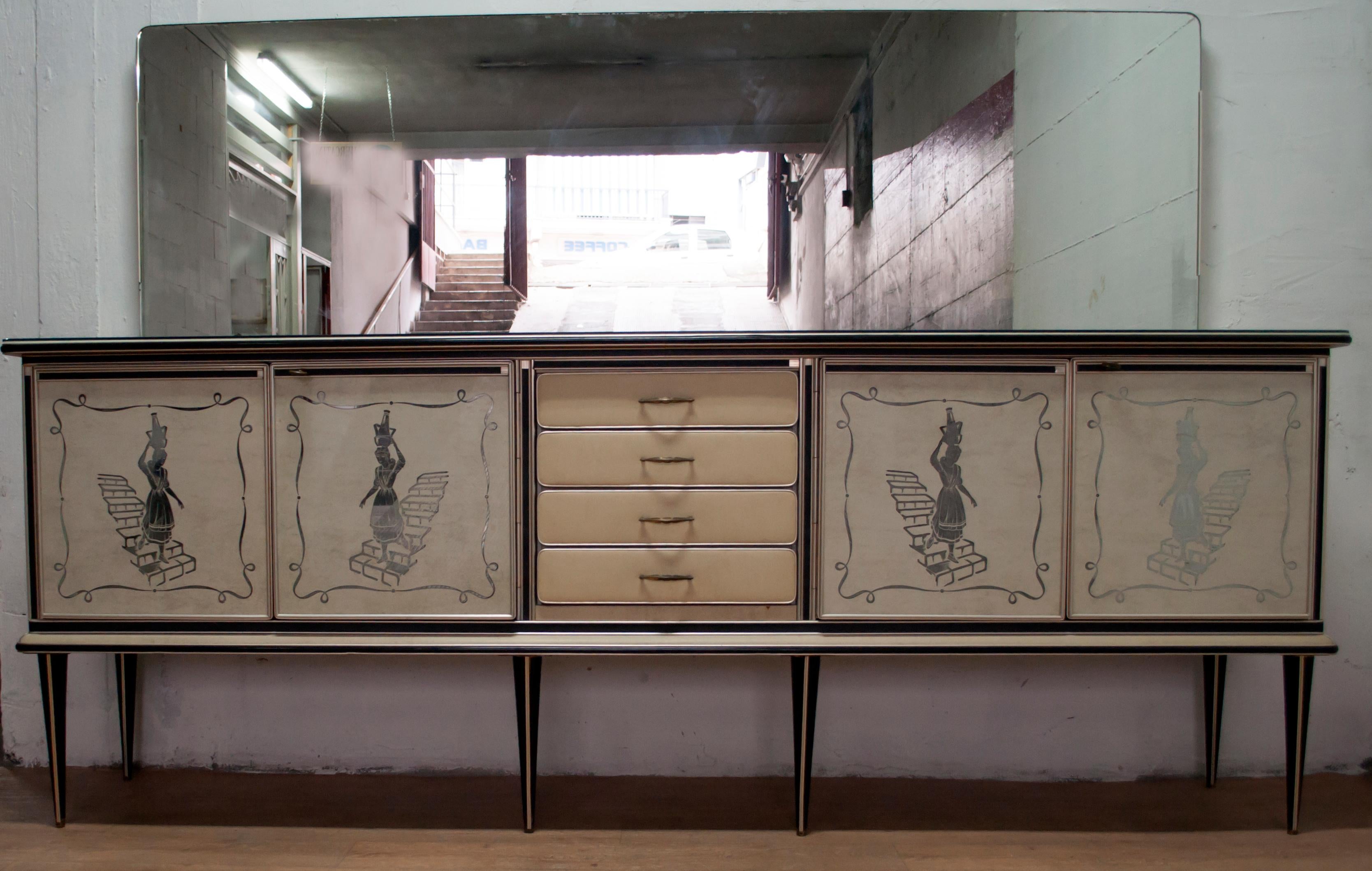 Rare and highly collectable sideboard designed in Italy by Umberto Mascagni of Bologna. Cabinet sideboard with four doors and four drawers from the 1950s was realized with back-stained glass doors, four doors with a woman walking down the stairs.