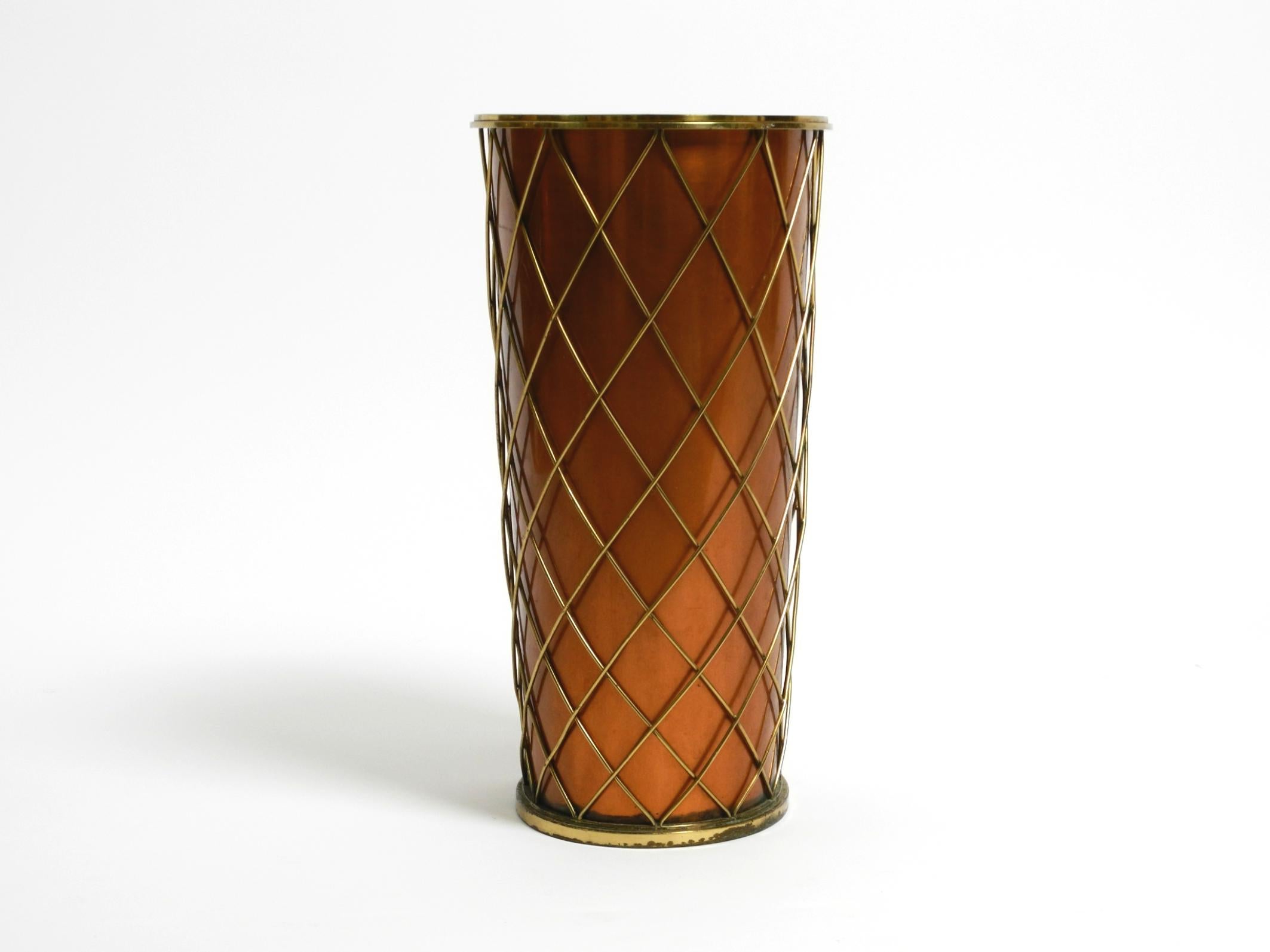 Mid Century umbrella stand by Vereinigte Werkstätten made of copper and brass For Sale 11