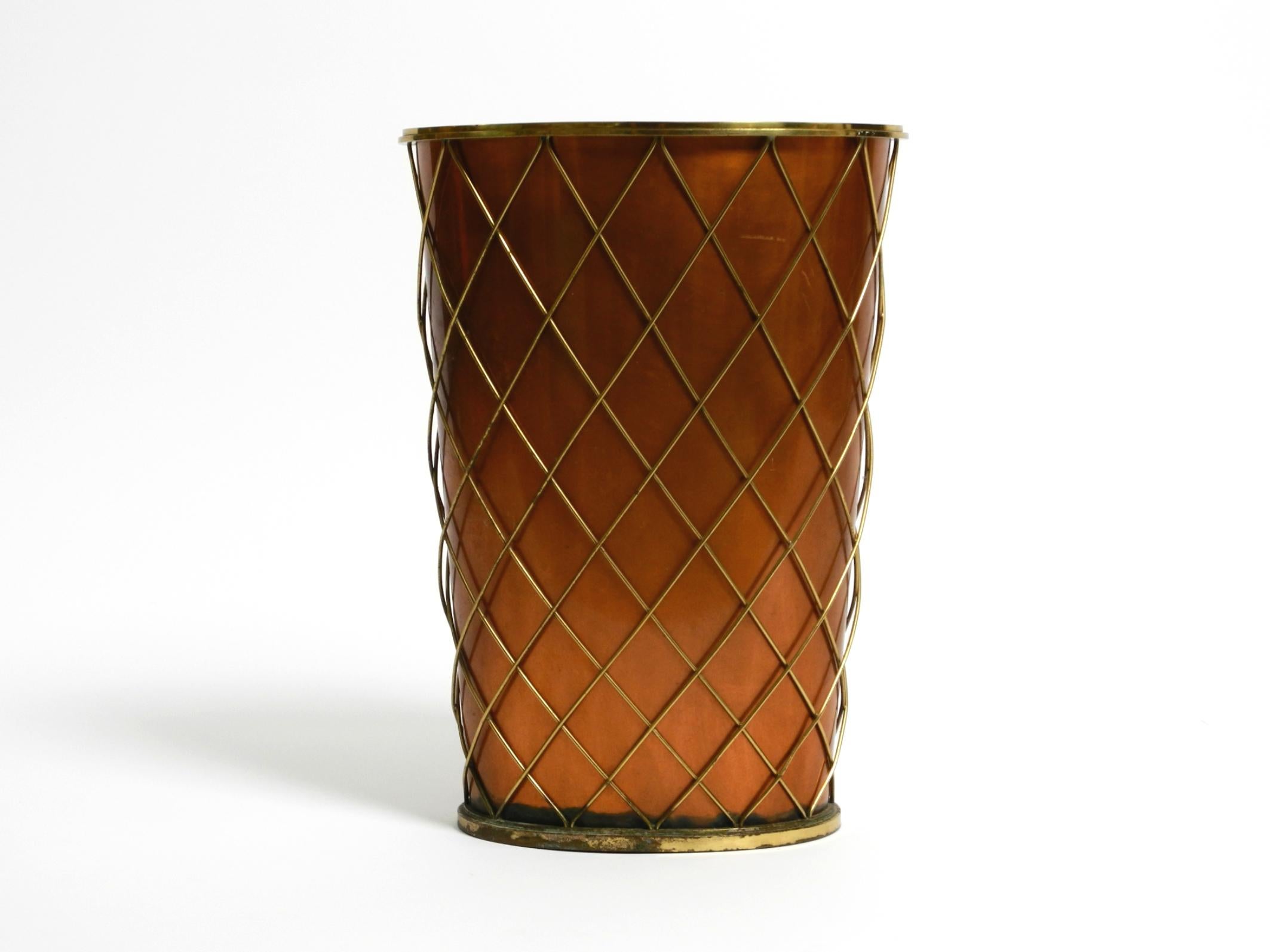 Mid-Century Modern Mid Century umbrella stand by Vereinigte Werkstätten made of copper and brass For Sale