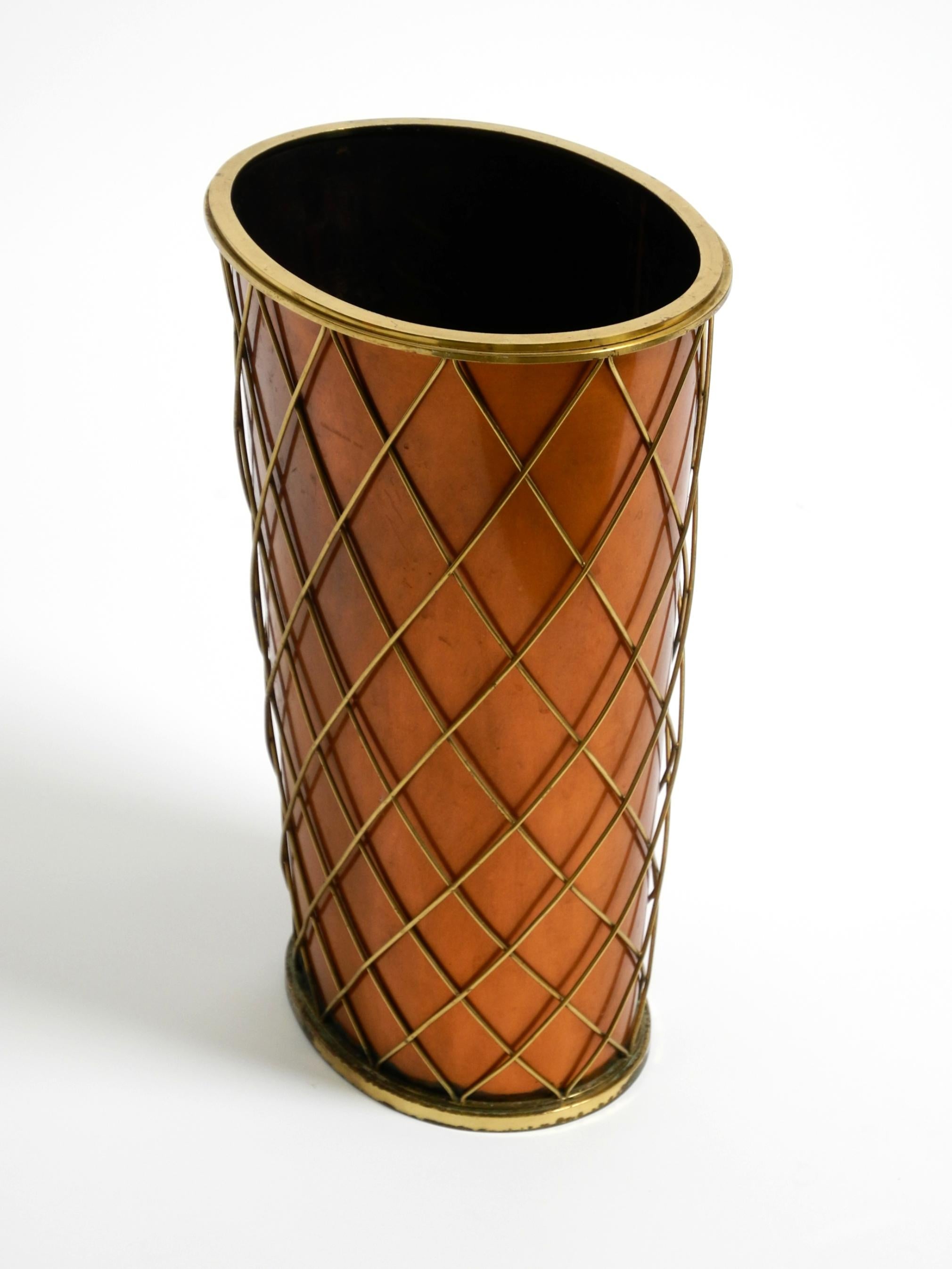German Mid Century umbrella stand by Vereinigte Werkstätten made of copper and brass For Sale