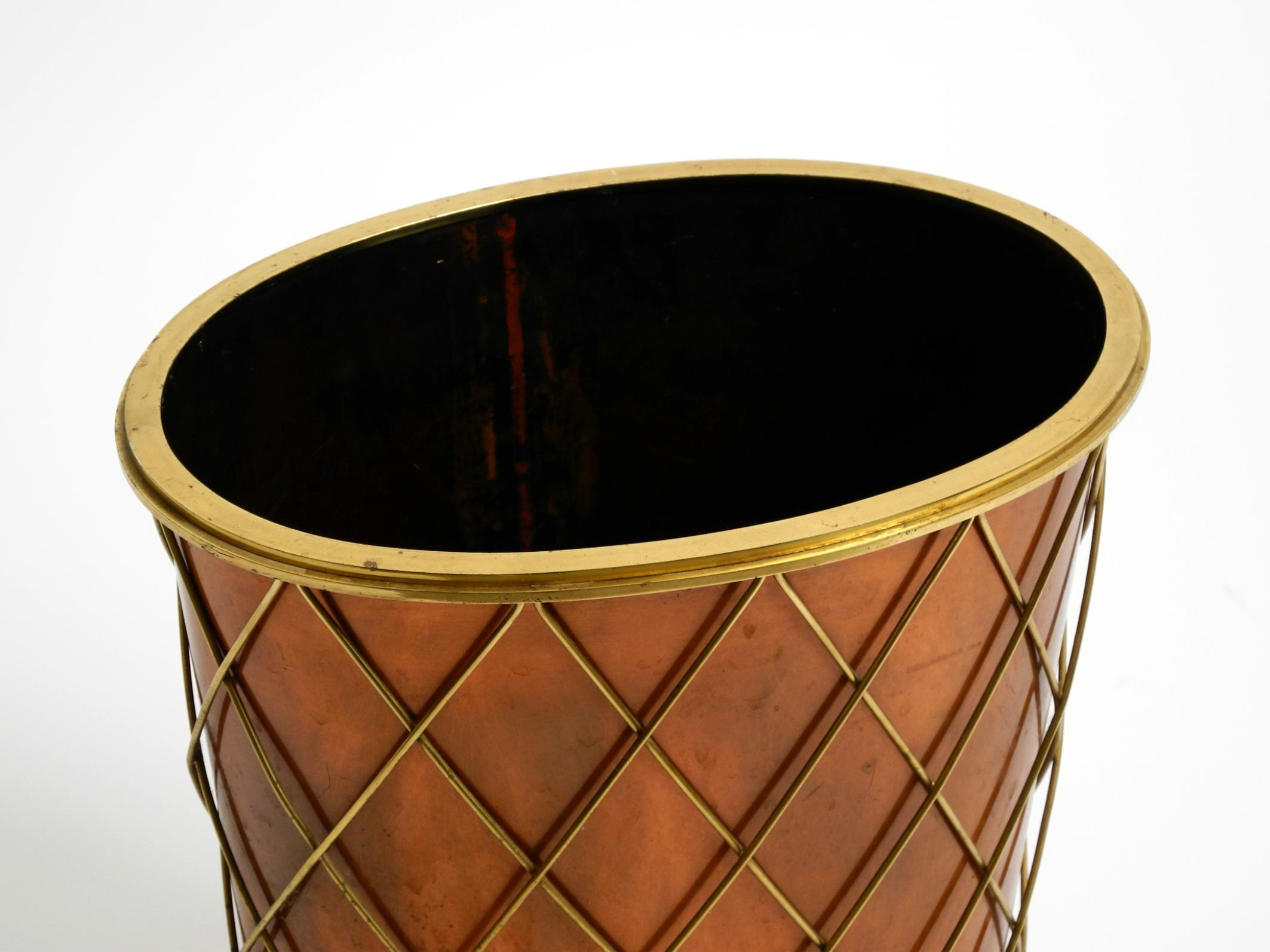 Mid-20th Century Mid Century umbrella stand by Vereinigte Werkstätten made of copper and brass For Sale