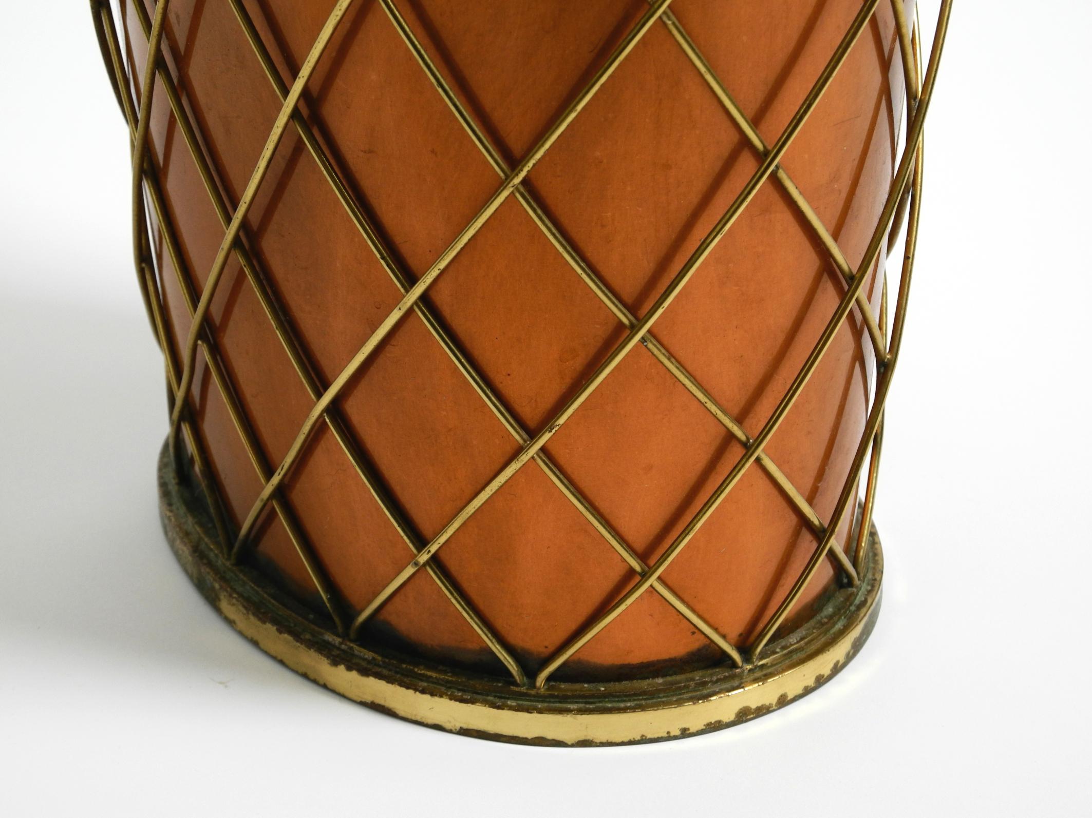 Brass Mid Century umbrella stand by Vereinigte Werkstätten made of copper and brass For Sale