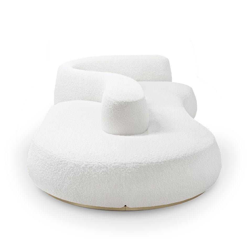 With this design, Karim Rashid wanted to create a place where one can relax,
ideate, connect and dream. This uniquely designed sofa features a distinctive shape that will be loved by all design lovers searching for an eccentric, but
a stunning