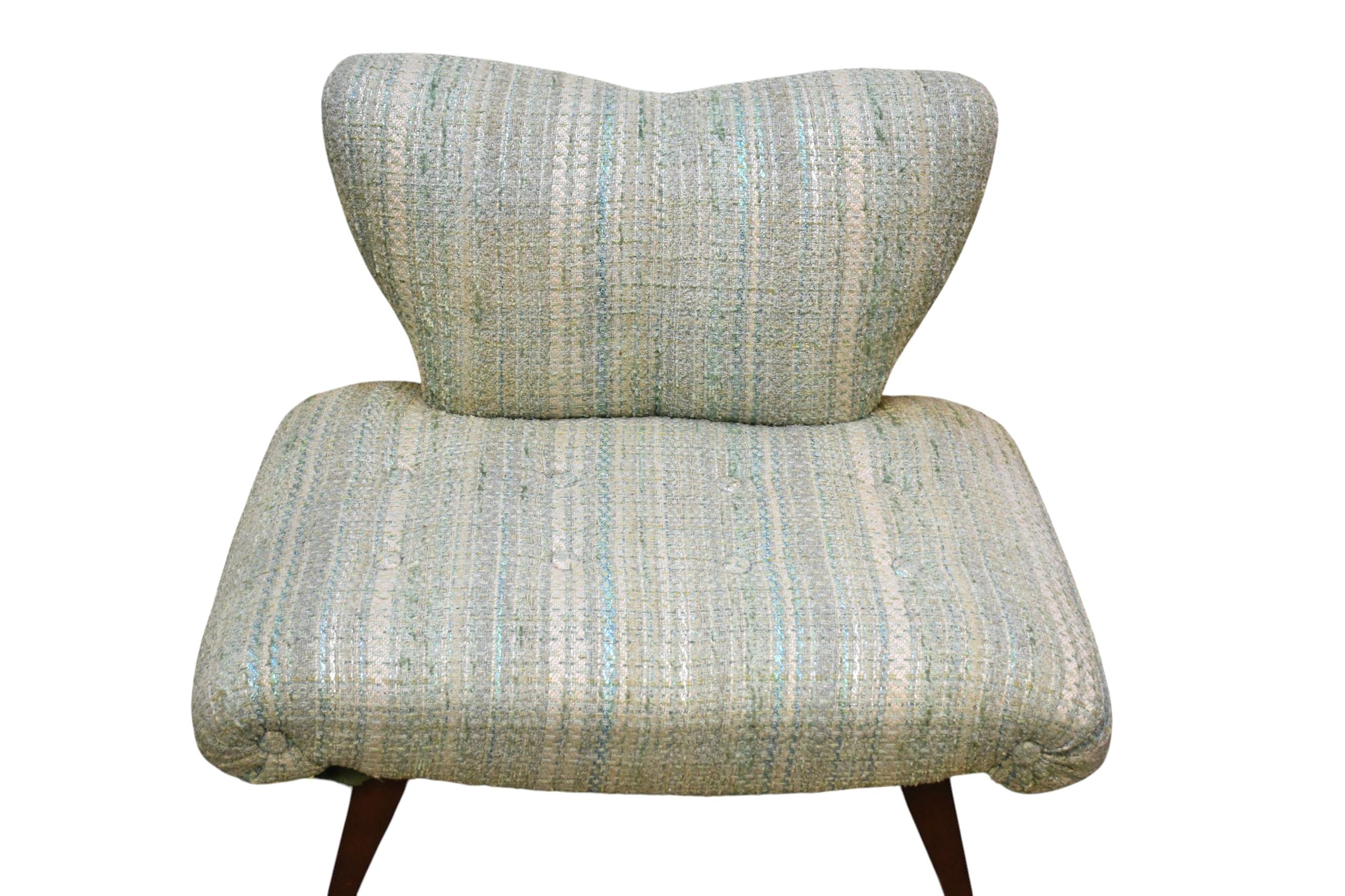Pair Mid-Century Tweed Upholstered Slipper Chairs, circa 1950s-60s. Chairs feature upholstered contoured backs and gently sloped, armless profiles. Chairs are upholstered in original textured tweed fabric with metallic threads, shades of teal, light