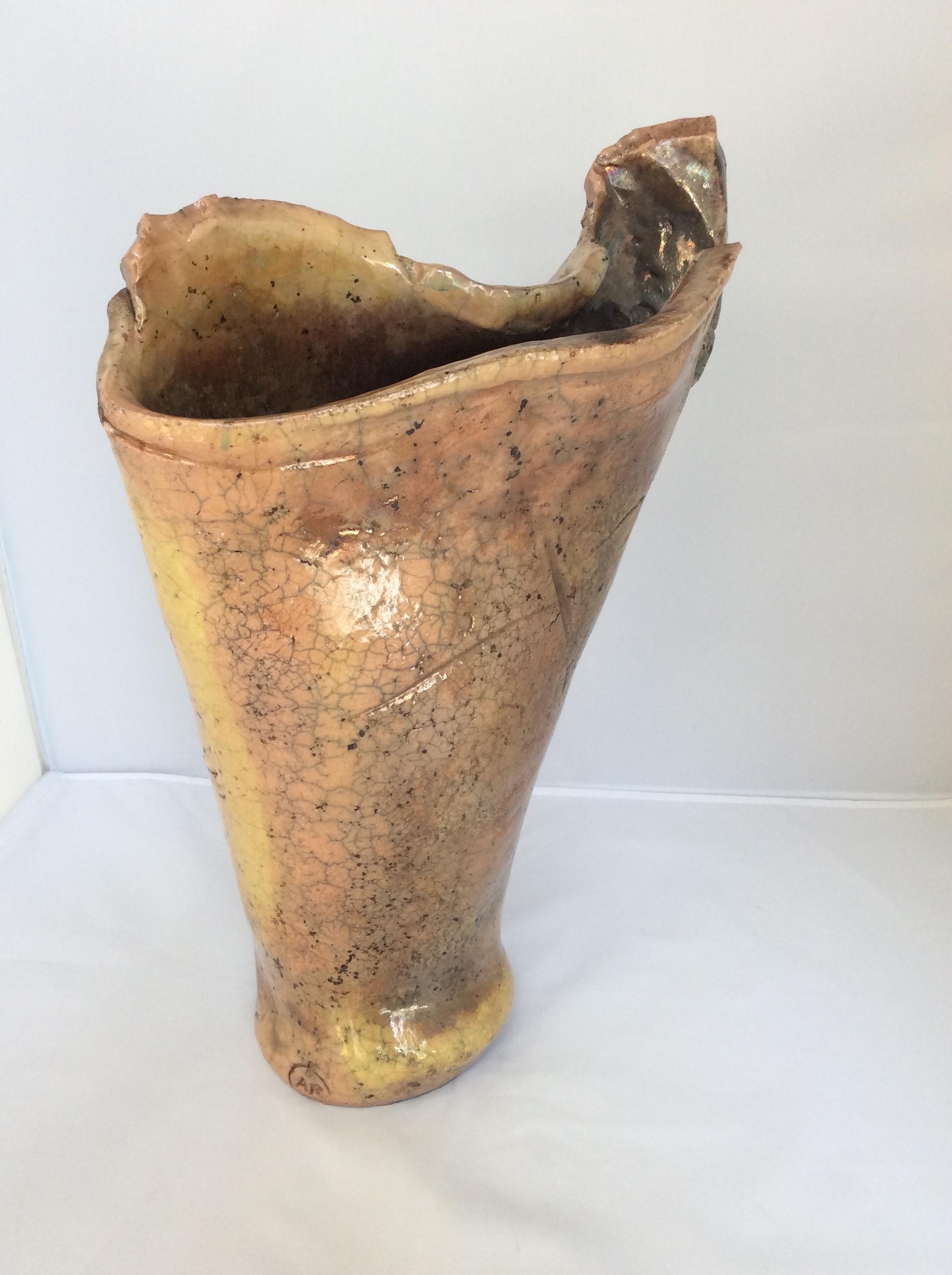 Large irregular shaped stoneware sculpted vase stamped A.R., from Vallauris, Circa 1970s. 

Truly stunning piece that will look great in any room. Look closely, there are gold and silver tones which are seen mostly in Japanese sculptures. There the