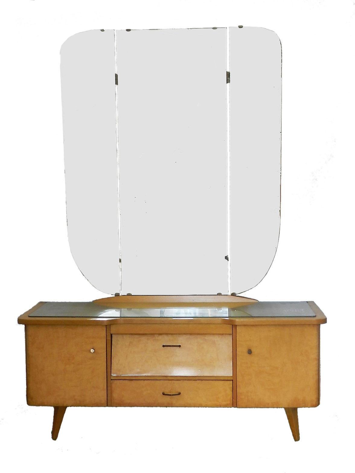 Midcentury dressing table vanity unit German Beider circa 1970 with or without mirror
Mirror is easily removed
Stratified wood cherry with high shine
Mirror has part of original label from maker shows part as 'Beider'
Good vintage condition with