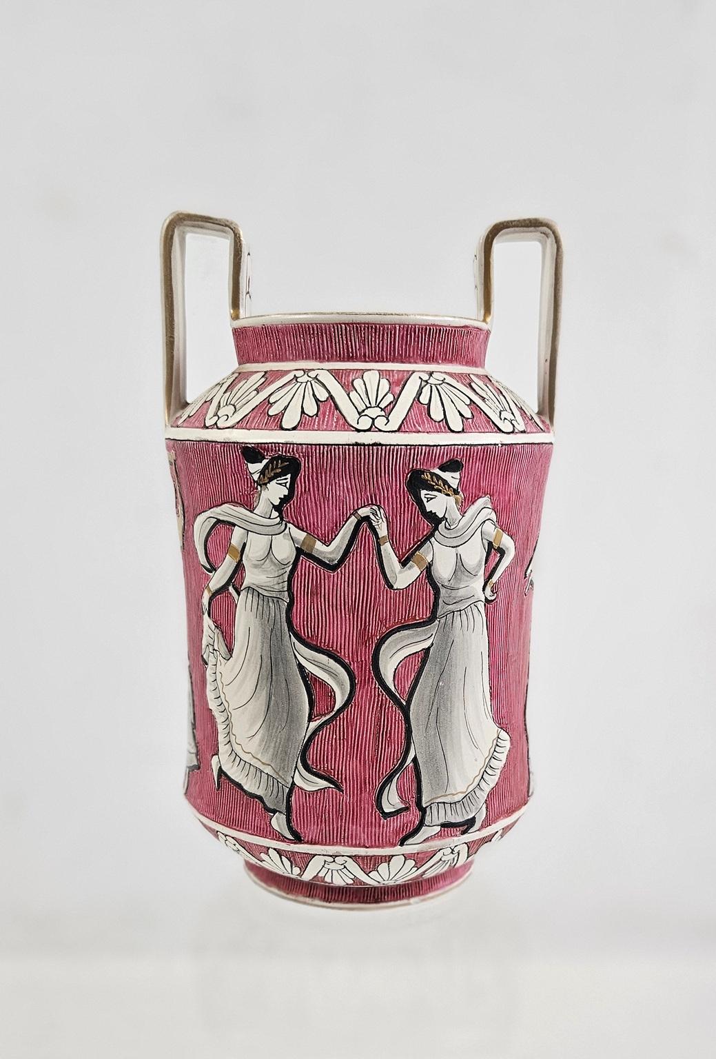 A unique piece by the renowned producer Deruta of Umbria, Italy. This piece is produced in the 1950's and has a greek motif in vibrant pink, white, black and gold. The condition is perfect without any chipping. It is signed and has the trademark
