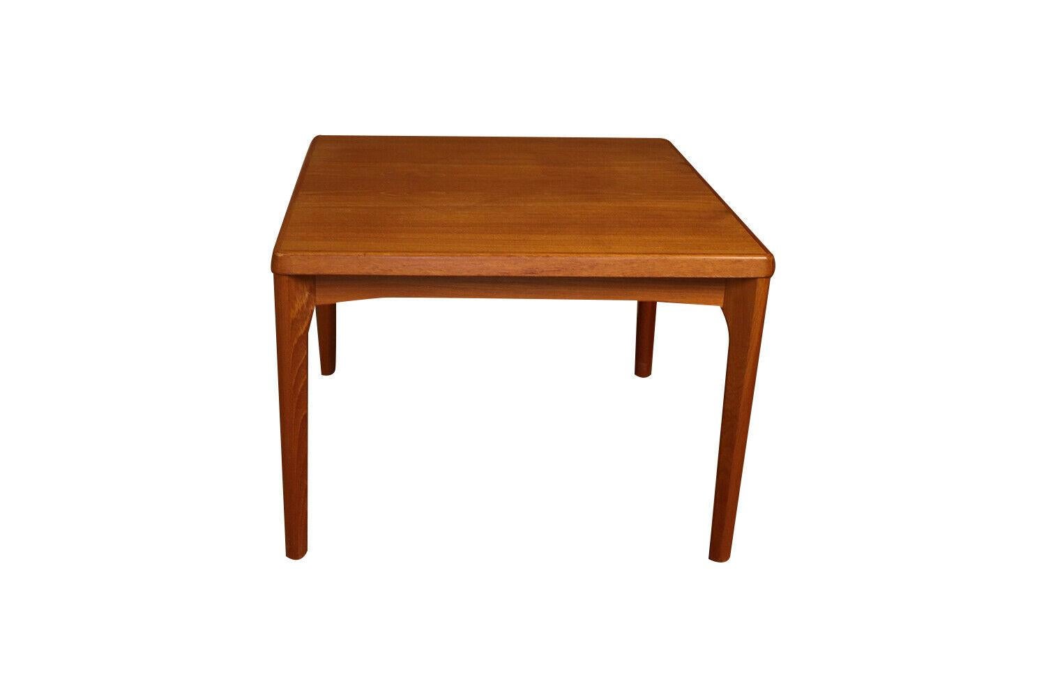 Exceptional Danish Modern teak, Mid Century Modern, vintage Scandinavian design, teak, side table by Vejle Stole & Mobelfabrik, made in Denmark. Features a square top with rounded edges and a beautiful rich teak color throughout. Resting on sturdy
