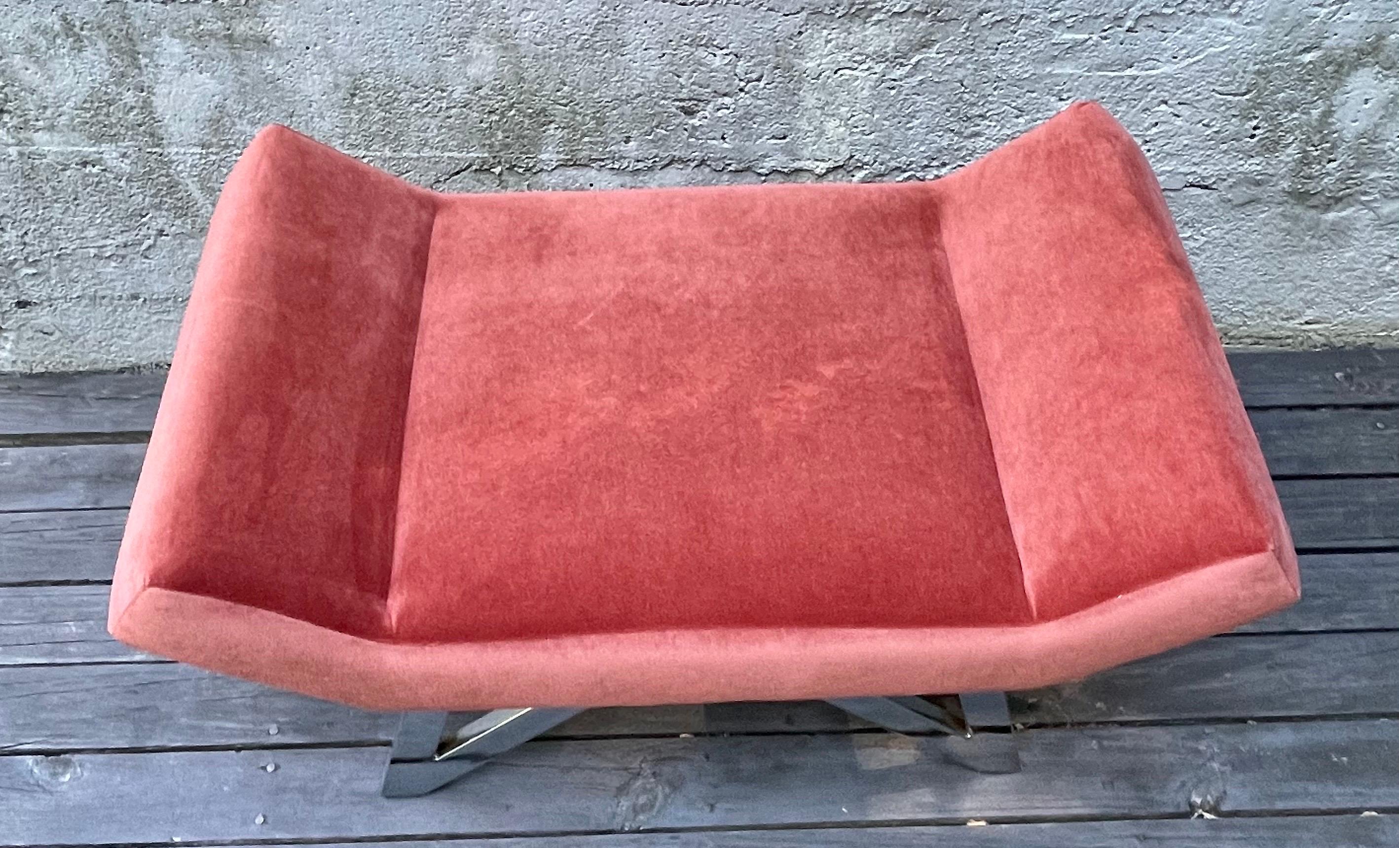 Very cool mid century bench newly reupholstered in cotton velvet with a triangular shaped chrome base, beautiful salmon color. Made by The Hastings Hall Furniture Co. in Canada.