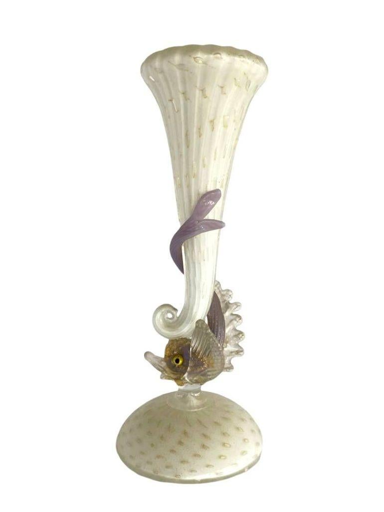 A very fragile and delicate vintage Venetian Murano Glass-handled Dolphin vase by Salviati. It is in very good condition with no damage. It measures approximately 10 inches tall.

Unsigned