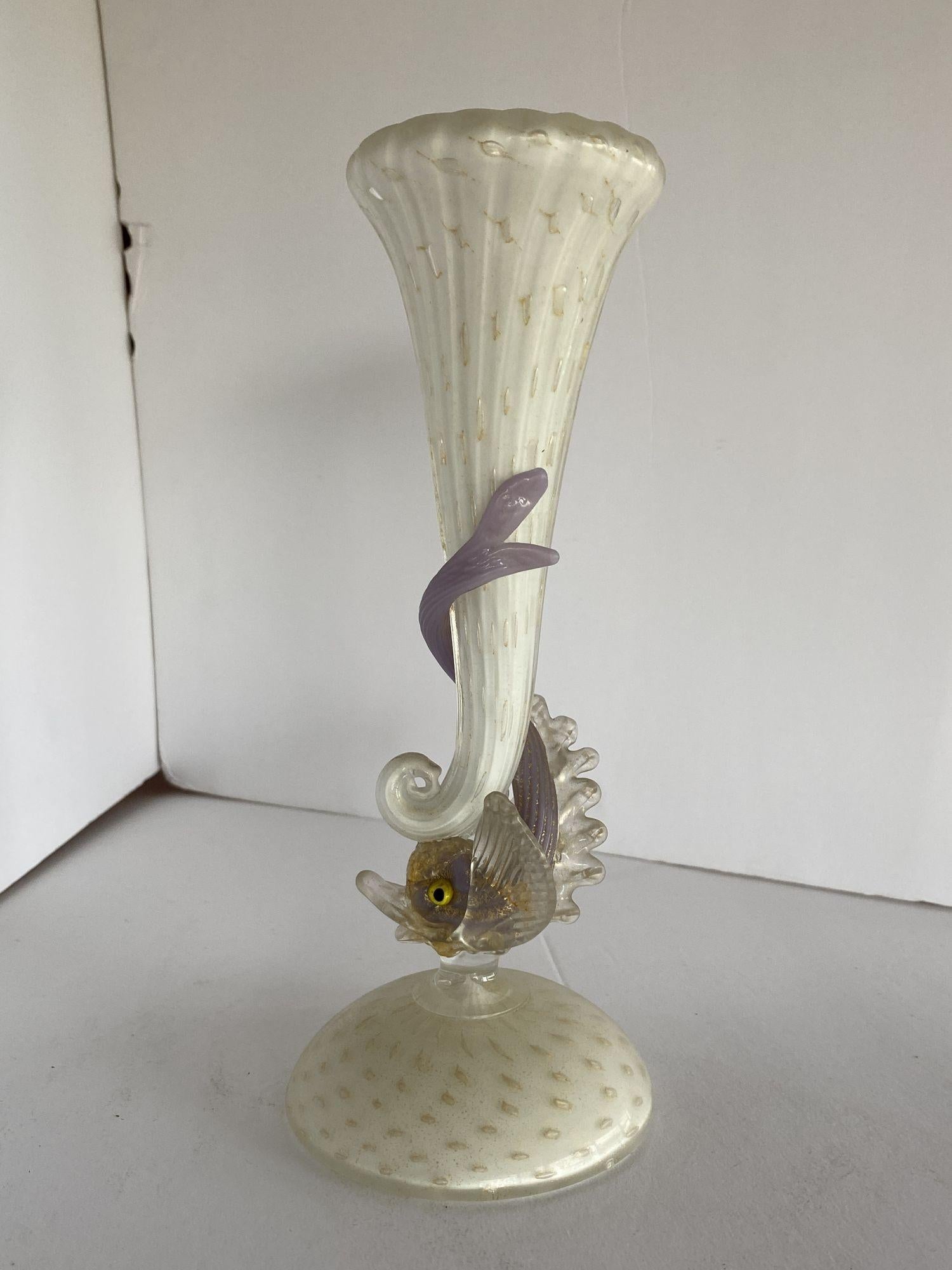 Very fragile vintage Venetian Murano Glass-handled Dolphin vase by Salviati. In very good condition with no damage. Measures approximately 10 inches tall.
 
Unsigned