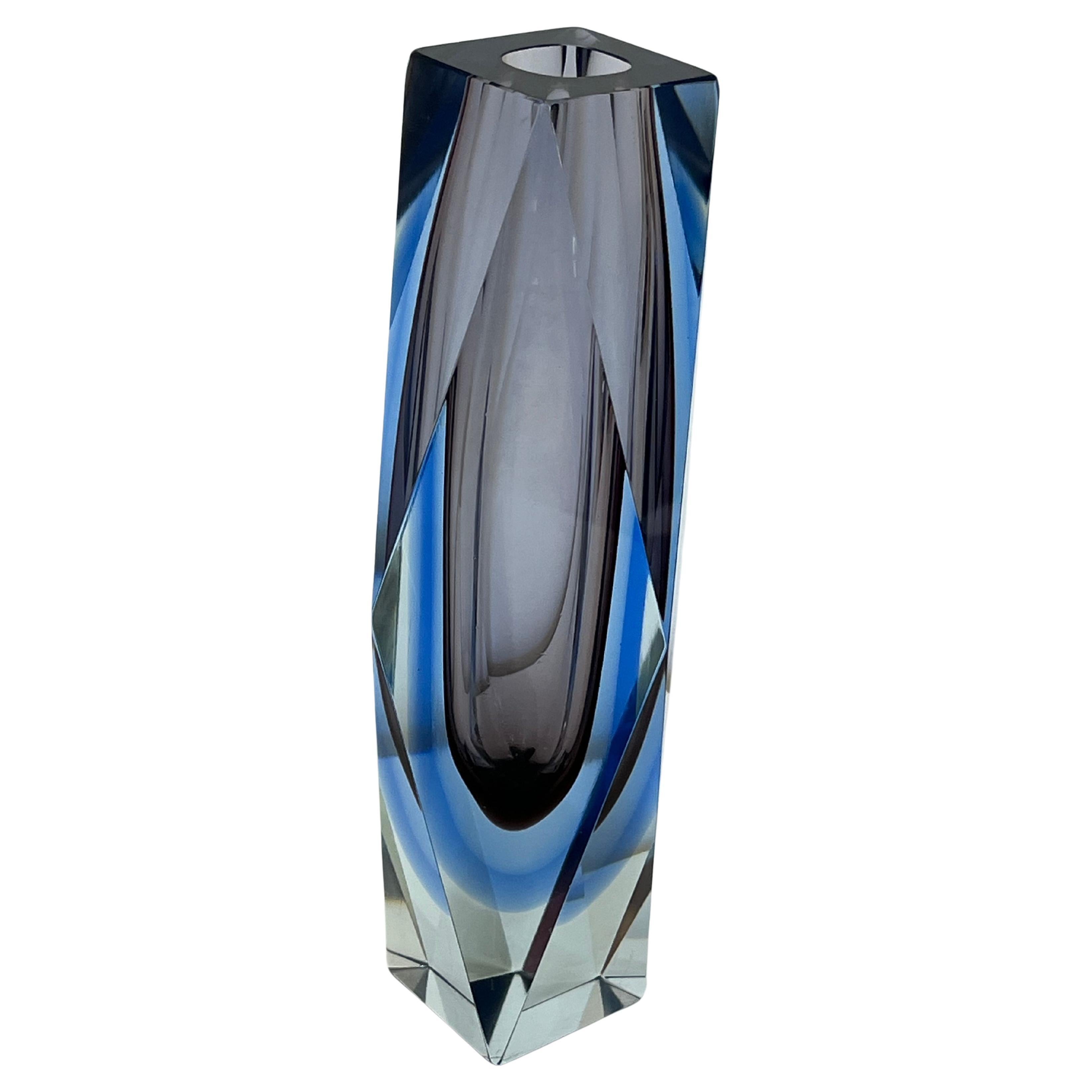 Mid-Century Venetian Murano Glass Vase 1960s
Purchased in Venice, in one of the most prestigious shops in Piazza San Marco.
Height 30 cm.
Intact with small signs of aging. Good conditions.