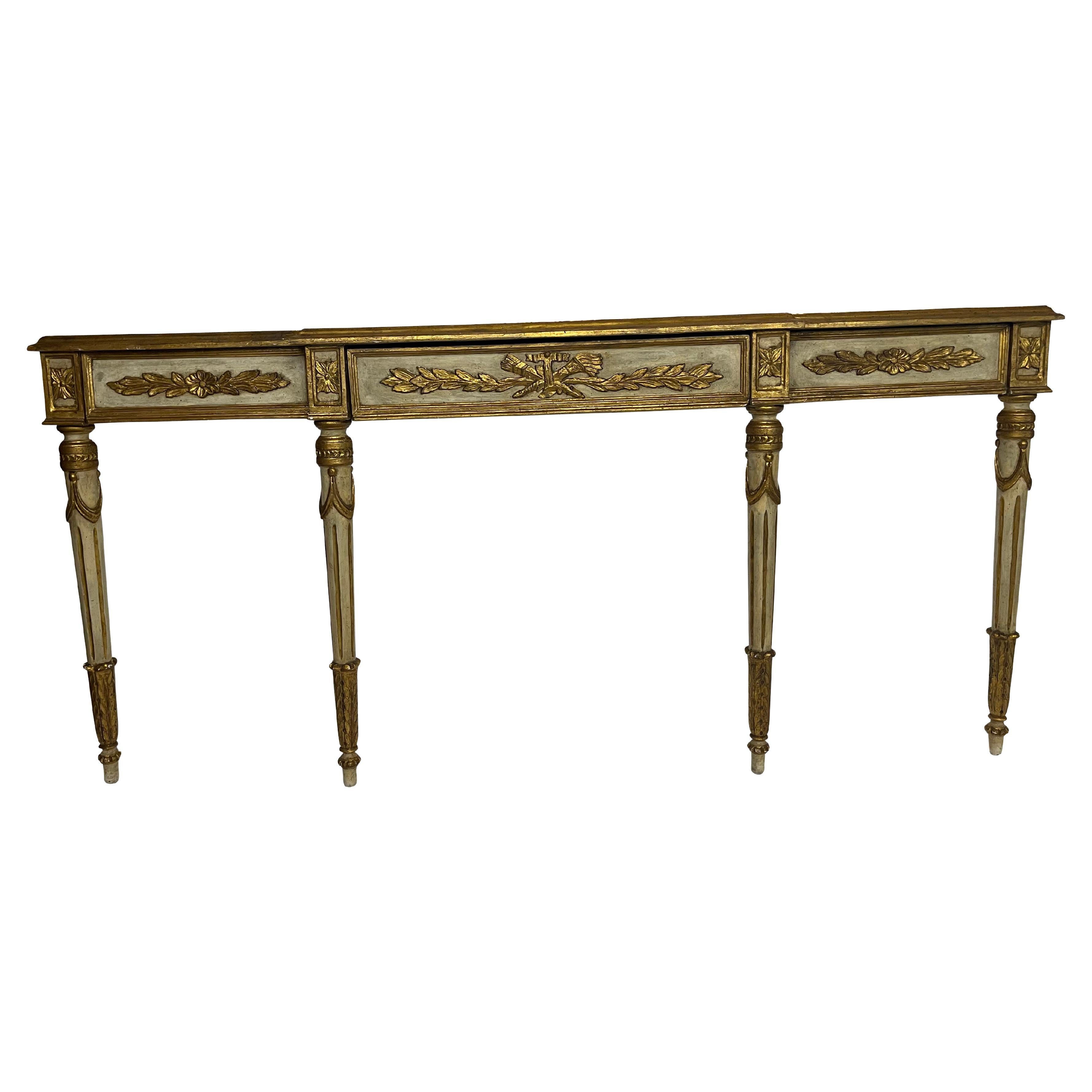 Mid century Venetian paint and gilt decorated console table 3 drawer - Measures 34 H x 72 L x 16.5 D with reeded legs ending in base with acanthus leaf decoration. Gilt decoration throughout with three working draws decorated with rosettes, floral