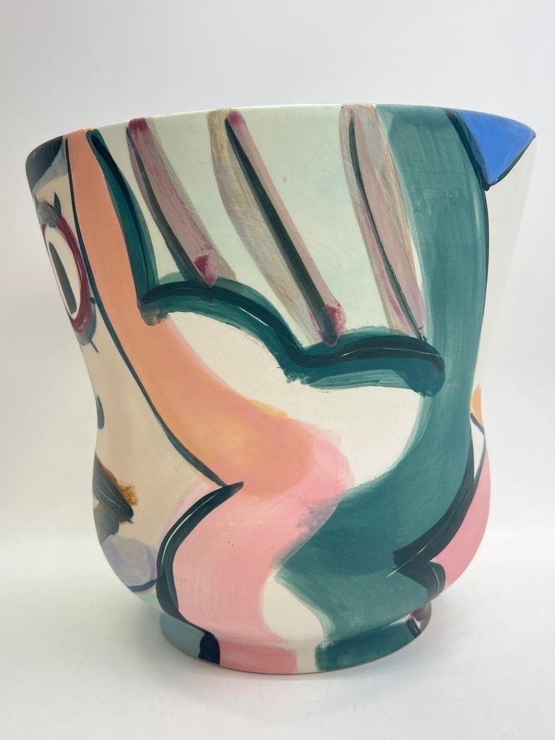 Stunning Mid-Century abstract Face Art Pottery Vase in Picasso Style, signed on bottom by Victoria Crowell 
Victoria Crowell is a porcelain artist. In 1975, she received her BFA from the New York State College of Ceramics at Alfred University. Her