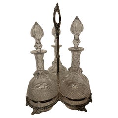 Mid century Victorian Cut Decanters in the original Silver Plated Stand