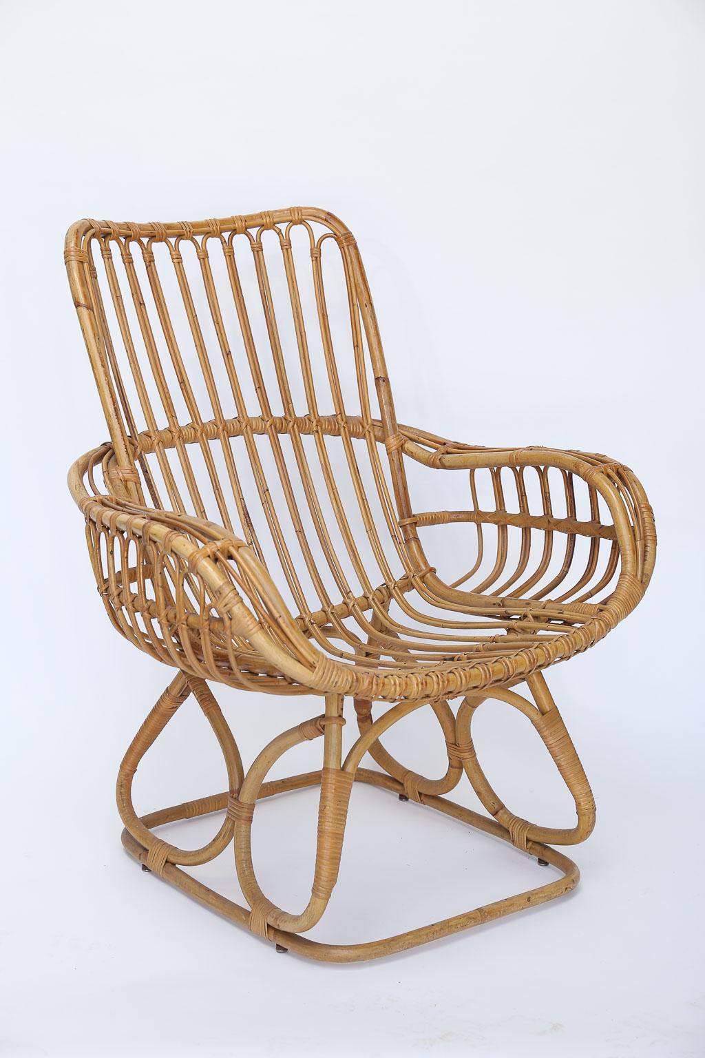 Made in Denmark a wonderful rattan armchair designed by Viggo Boesen. Curved and contoured for comfort, a perfect addition to your seaside home.