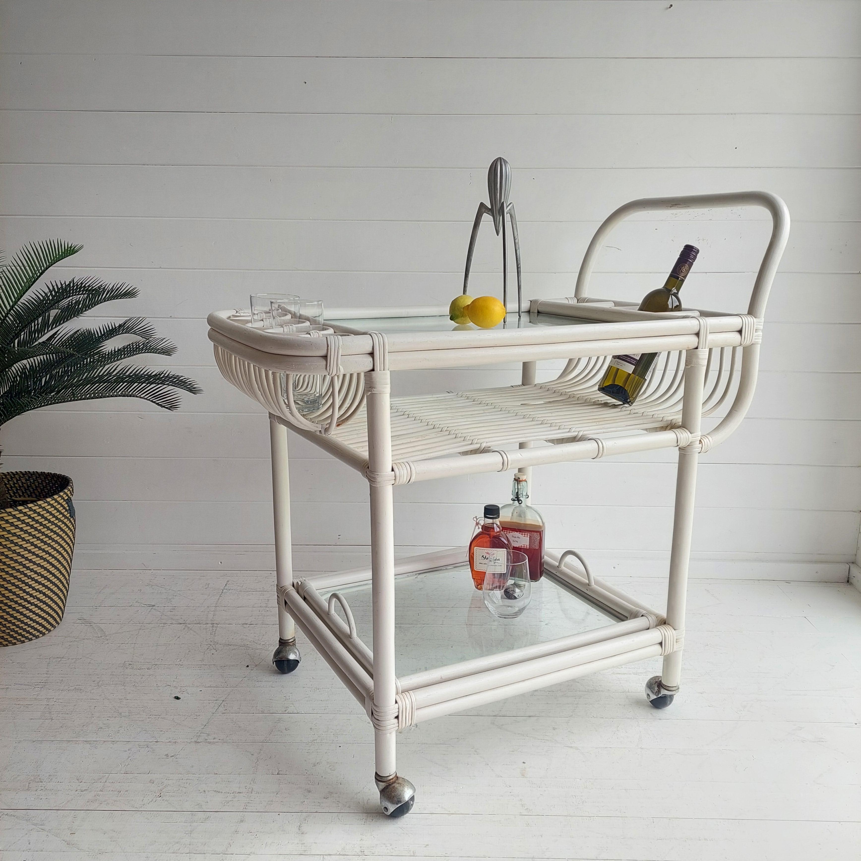 This is an amazing example of a 1960s/70s bamboo drinks cart/serving trolley 

Perfect for a mid century or vintage style bar area this is a very cool addition to your home.

Presented with its original white paint
A 3 tier bamboo drinks