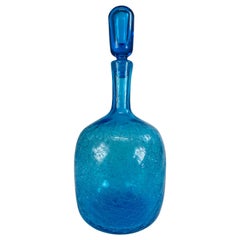 Mid century vintage Blenko blue glass jar with stopper.