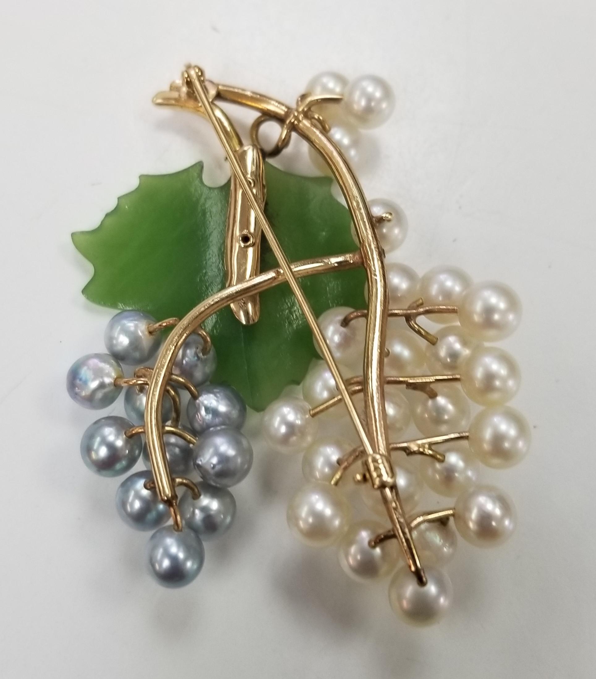 Round Cut Midcentury Vintage Brooch Features Carved Nephrite and Pearls in a 14 Karat Gold