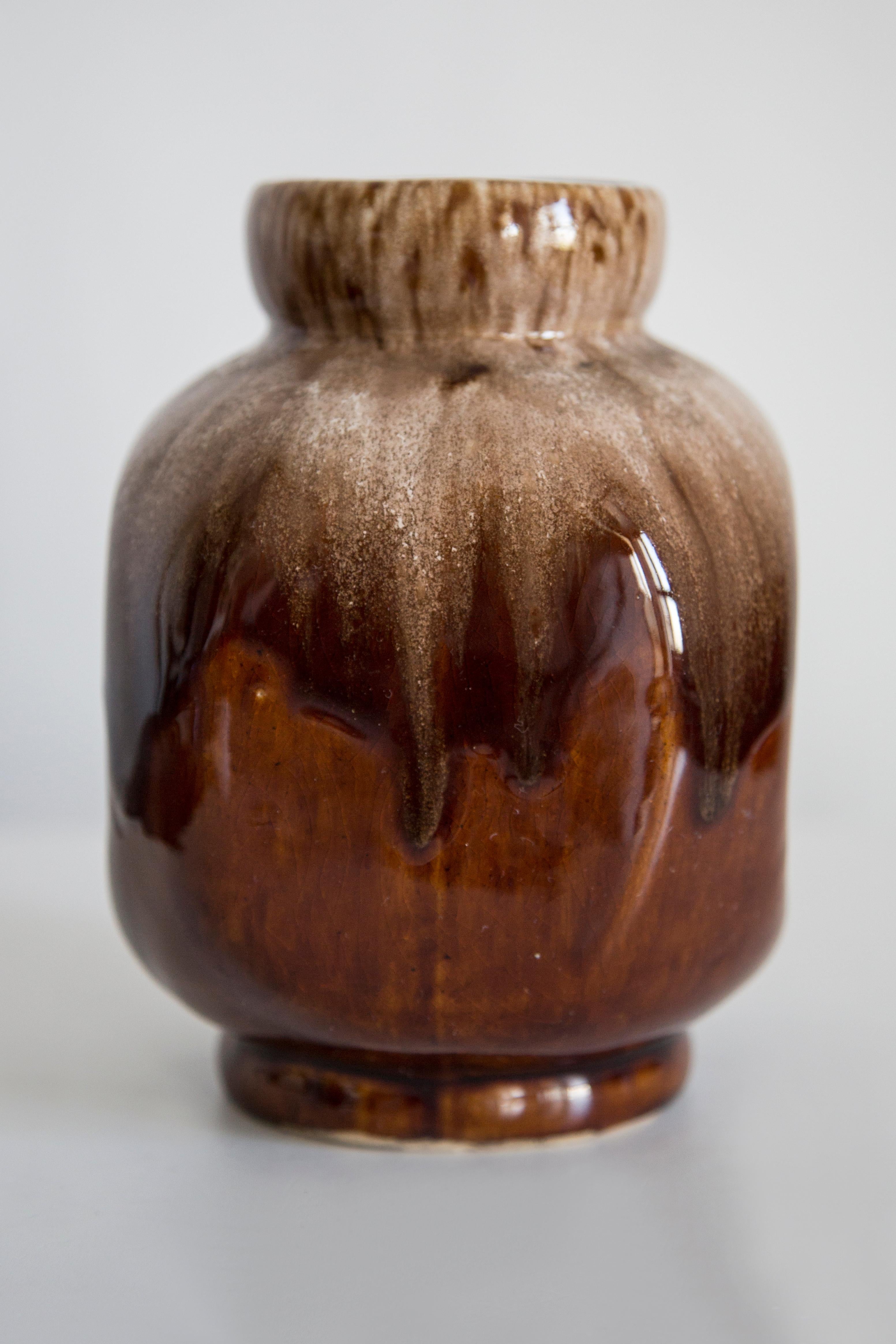 Vintage ceramic in very good condition. The vase looks like it has just been taken out of the box. No jags, defects etc. Beautiful deep brown color. Only one unique piece. 



