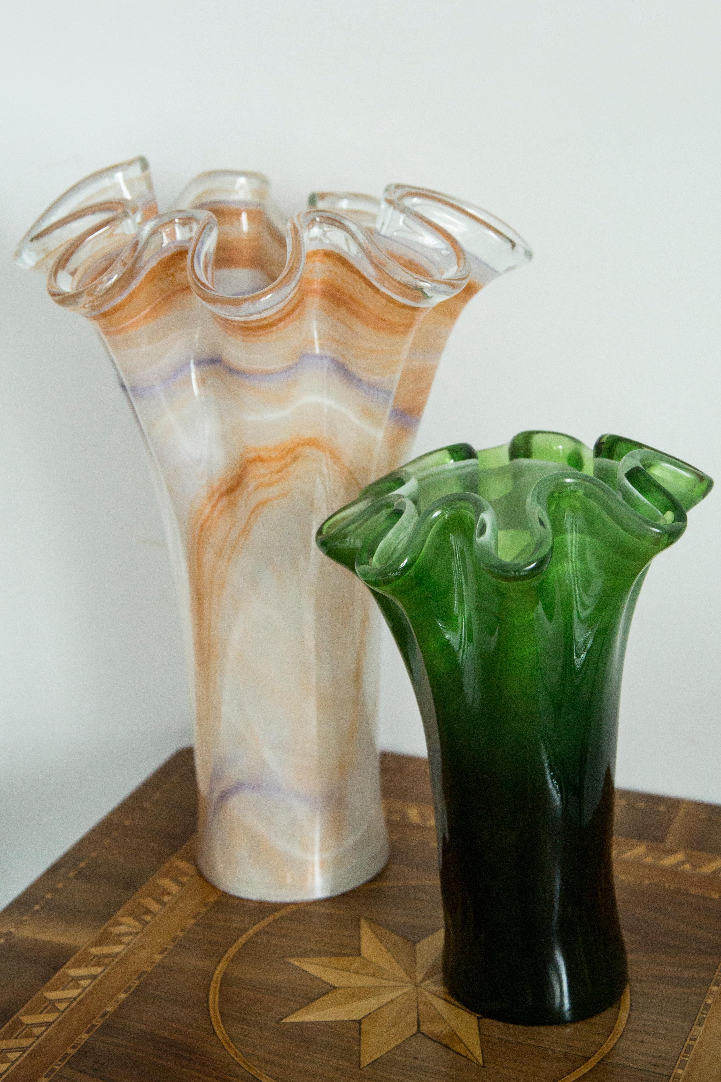 Beautiful vase made from Murano glass in perfect condition. The vase looks like it has just been taken out of the box. No jags, defects etc. Only one unique piece. 

Venetian glass (Italian: vetro veneziano) is glassware made in Venice, typically on