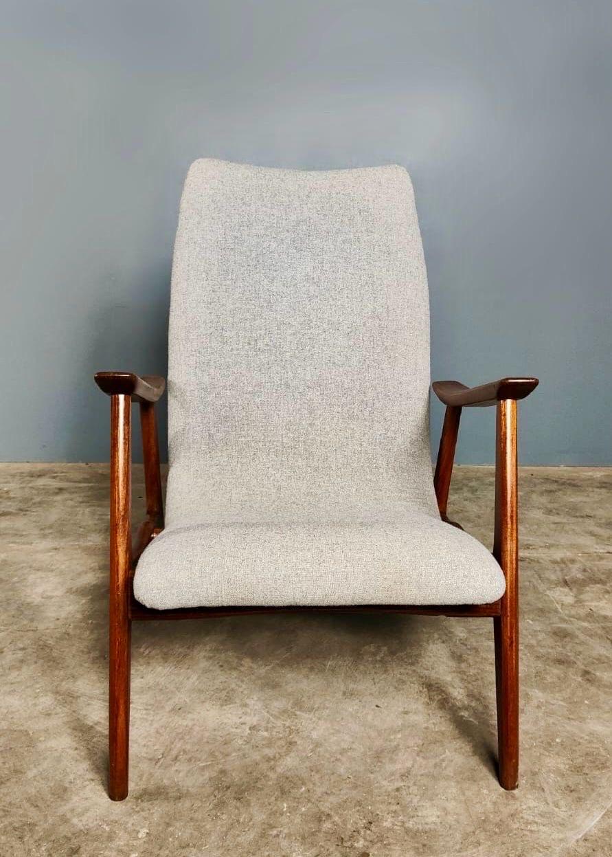 New Stock ✅

Vintage mid century grey wool and teak armchair by Louis van Teeffelen for WéBé

Dutch furniture manufacturer WéBé was founded in 1938 in Benden-Leeuwen. Originally called Walraven and Bevers after its two founders, the company’s name