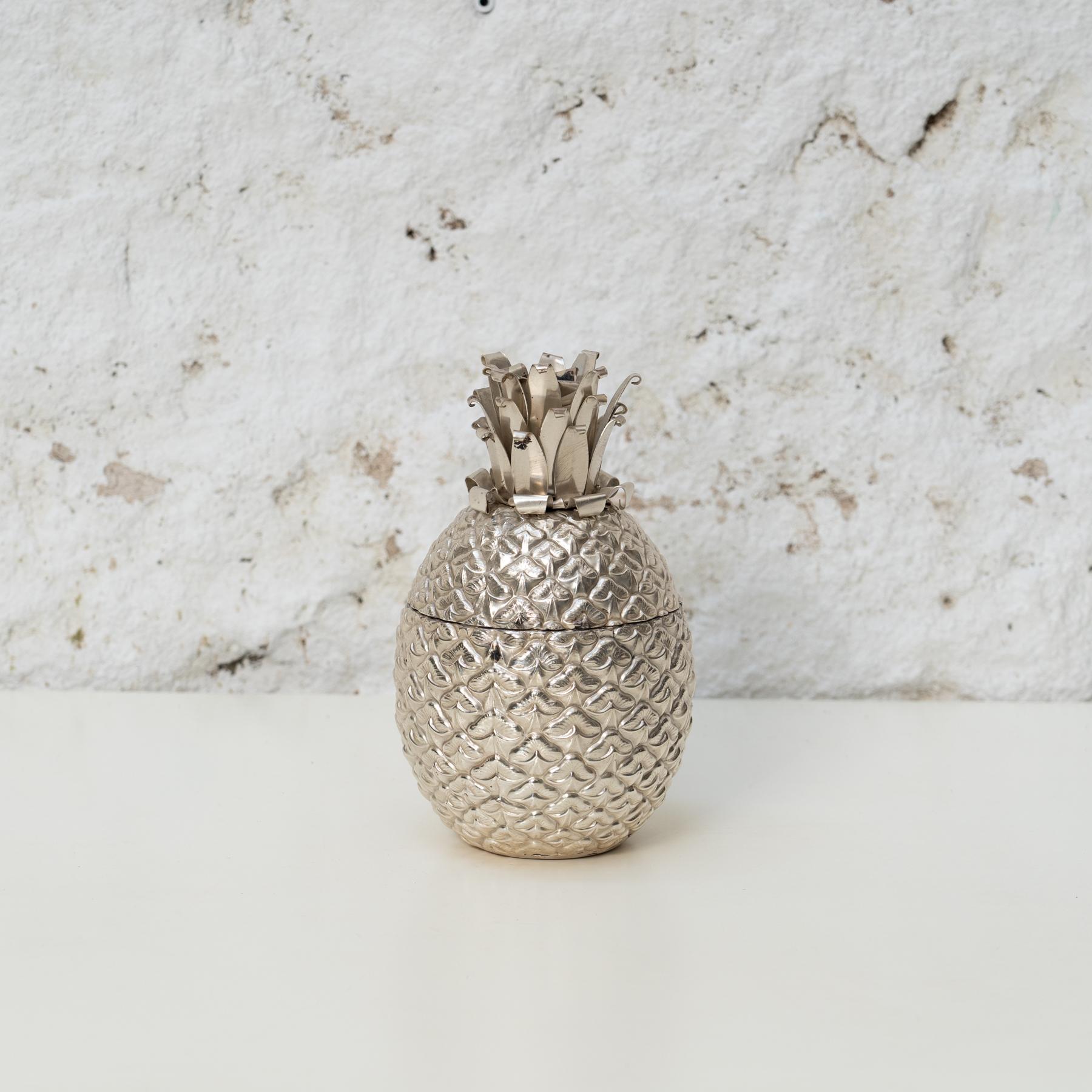 Mid-century vintage pineapple ice bucket by unknown artist, circa 1960.

Manufactured in Italy, circa 1960.

Made of Alpaca.

In original condition with minor wear consistent of age and use, preserving a beautiful patina.


 
