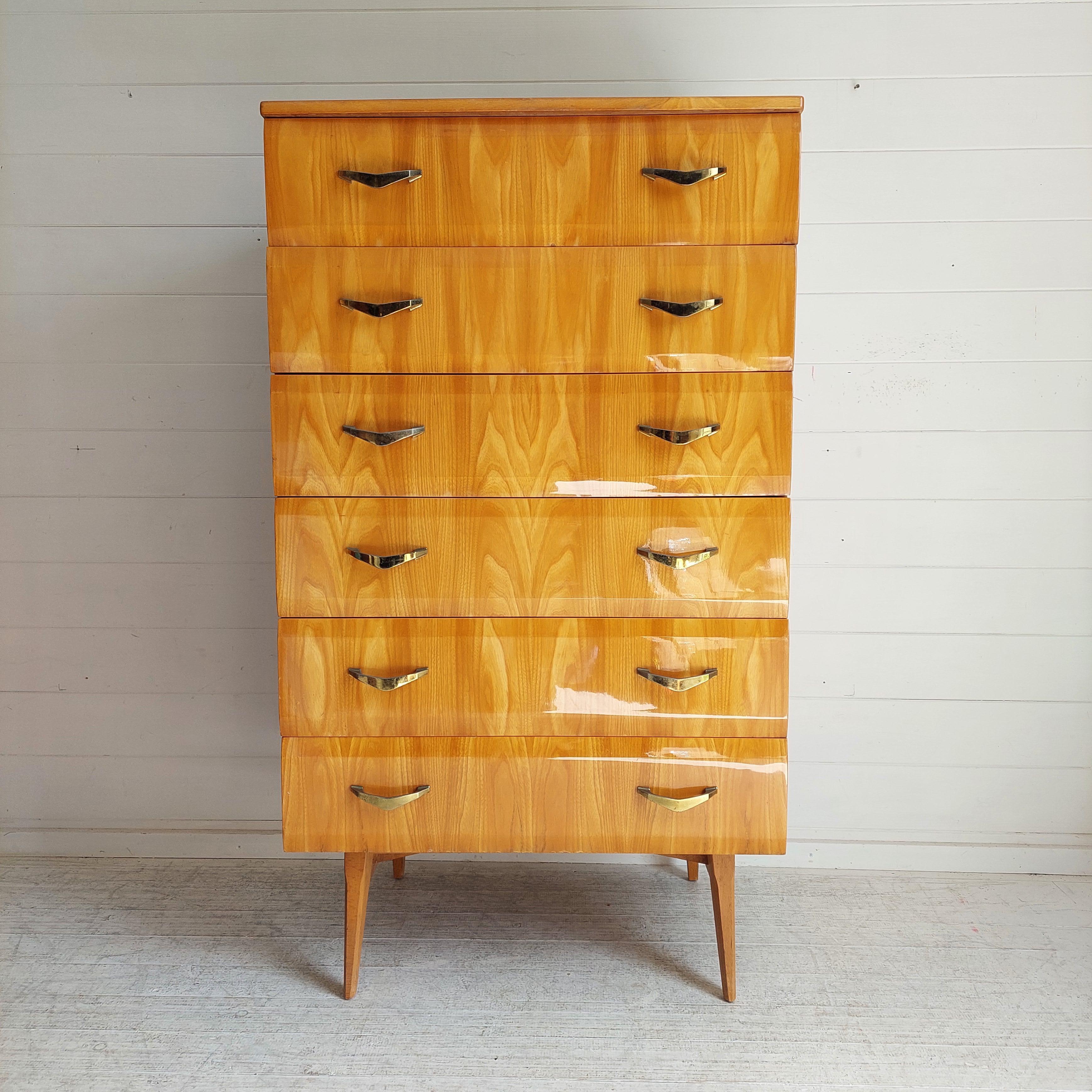 Produced by Meredew, England.
From the late 1950s and early 1960s. 
Produced by Meredew in the Letchworth factory in Hertfordshite, England. 
In all likelihood a design by Alphons Loebenstein. 
Inspired by Italian design from the 1950s, which was