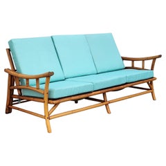 Midcentury Vintage Midcentury Rattan Bamboo Couch with Turquoise Cushions