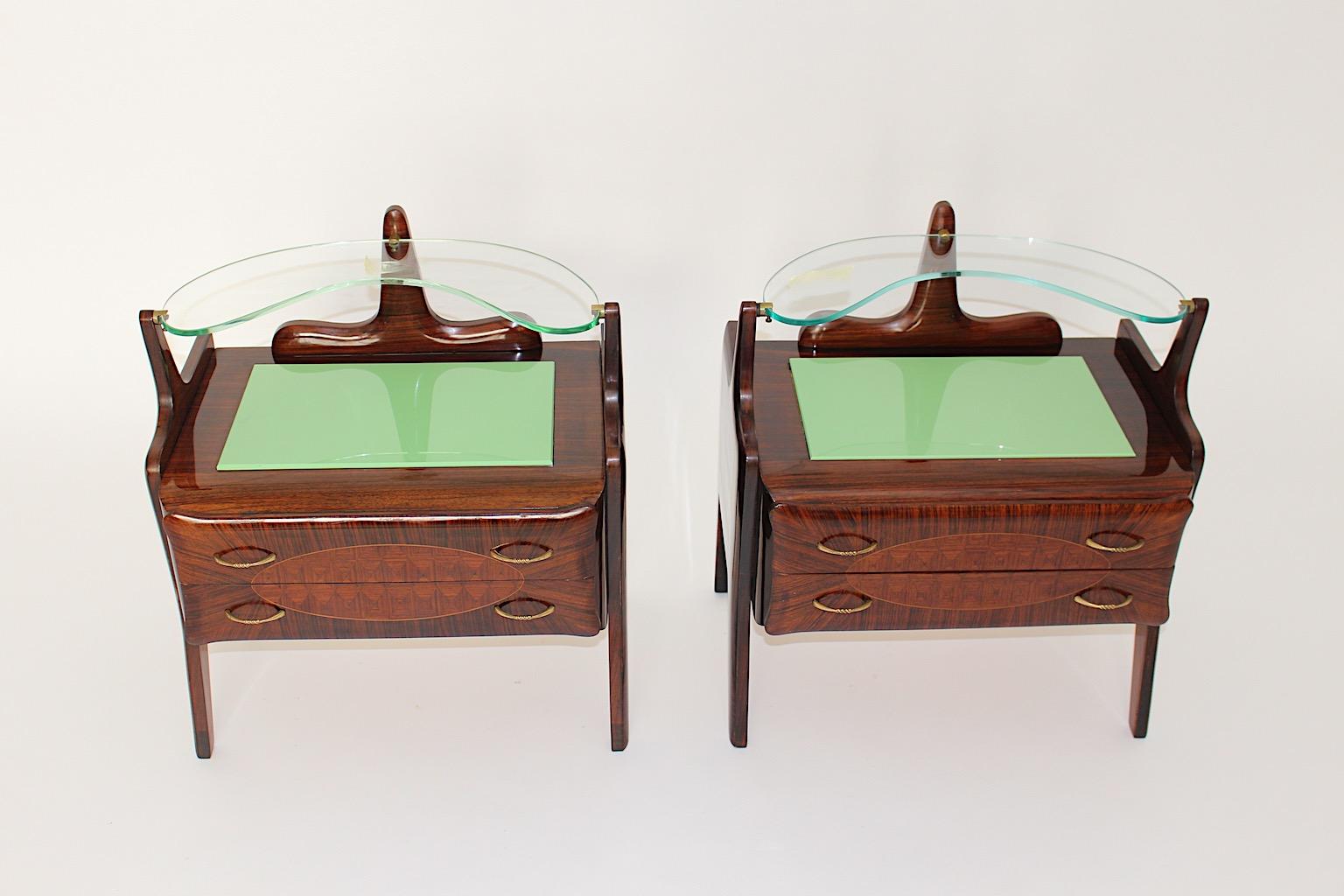 Mid-Century Modern vintage pair of sculptural nightstands or small chests from walnut, beech and plywood, which were designed and executed Italy 1940s.
Hand - made and high - quality features this extraordinary pair of nightstands.
Details like