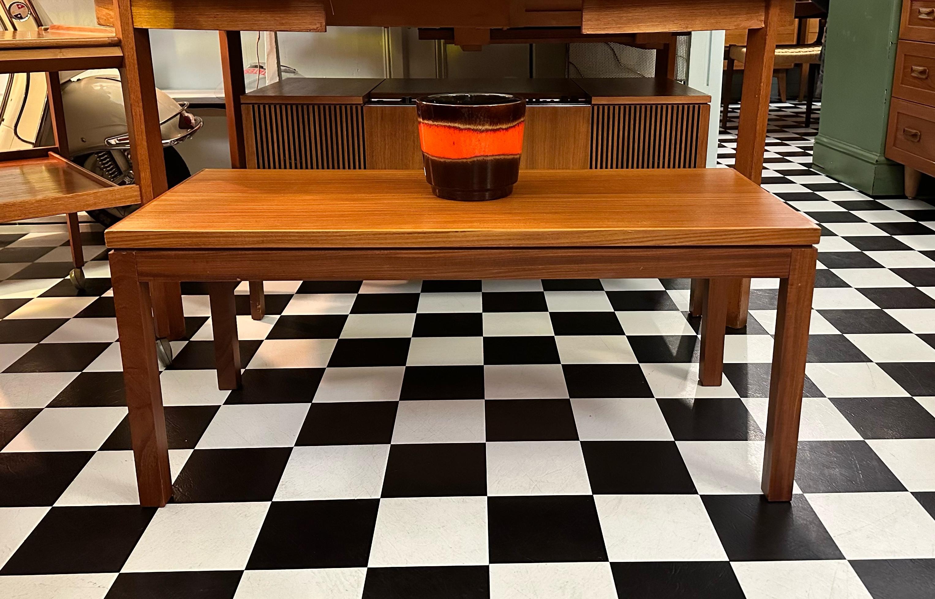 Stunning and unique rectangular coffee table. Beautiful design with lustrous teak grain throughout, clean lines and very stylish legs. This piece is a great example of mid-century craftsmanship, it is very well made.
Excellent vintage condition with