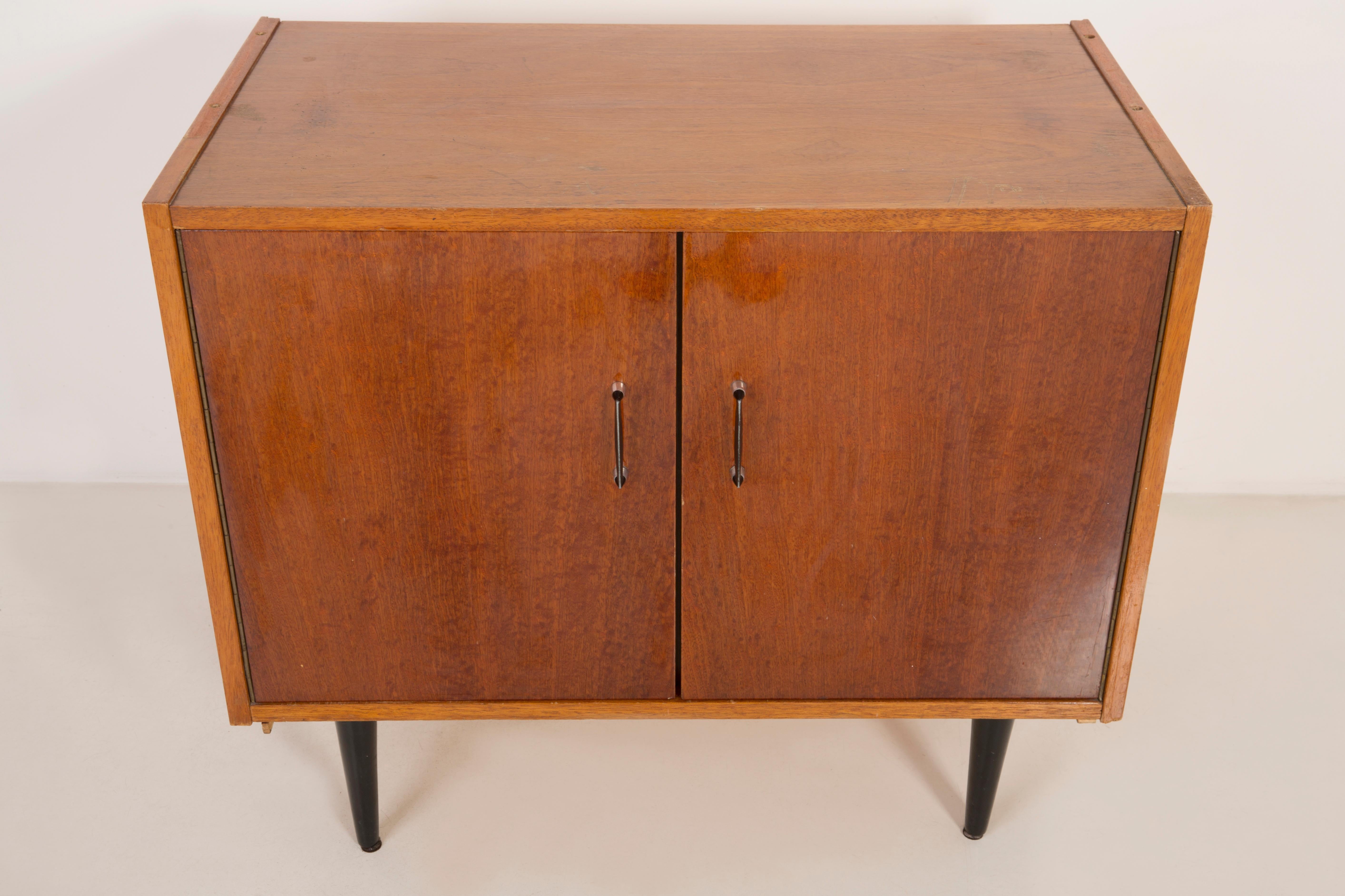TV side table/sideboard from the 1960s. It was manufactured in Poland. The table was made of wood, it was refreshed. Very good original vintage condition.