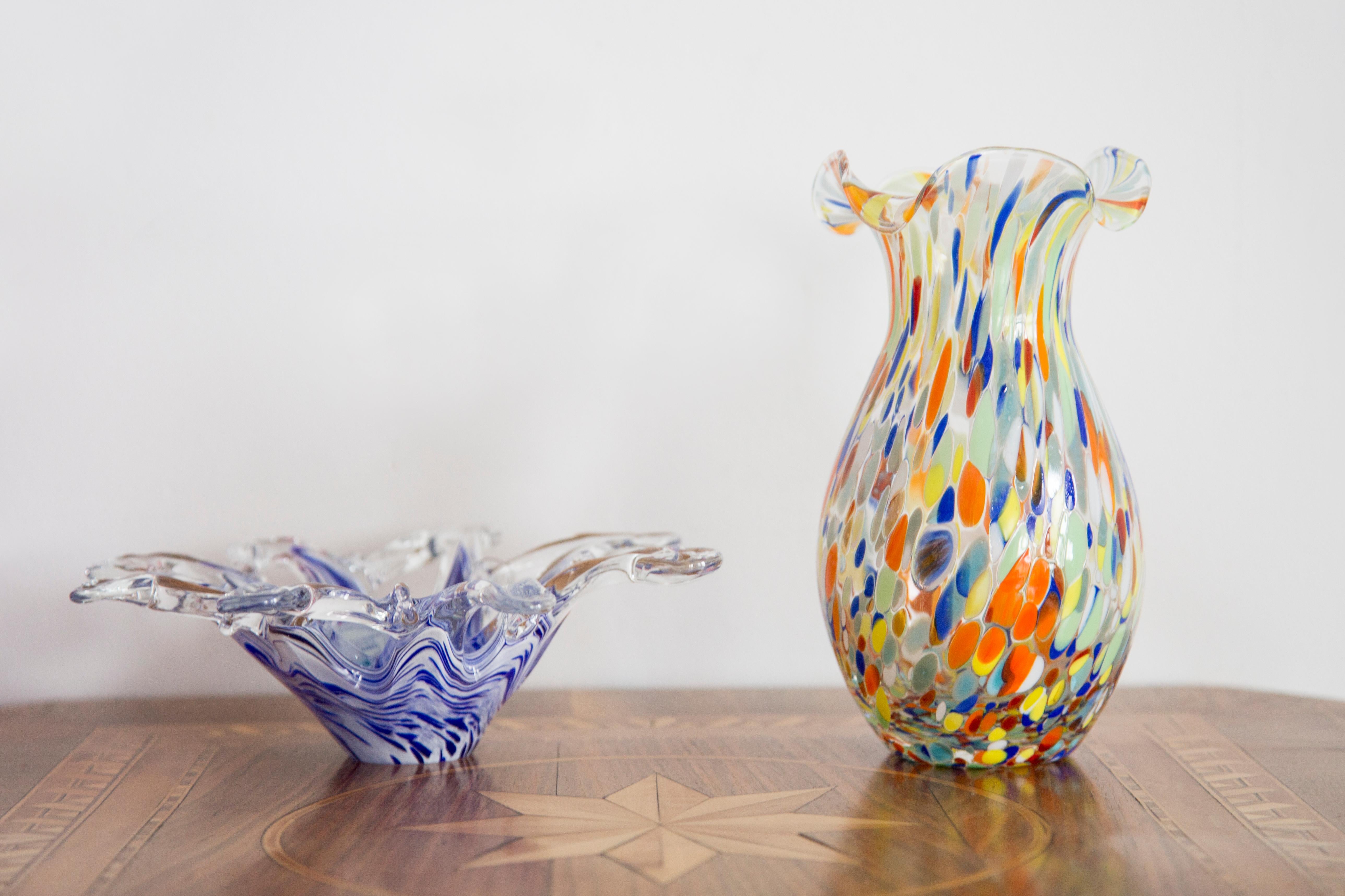 Glass in very good condition. The vase looks like it has just been taken out of the box. No jags, defects etc. Only one unique piece. Murano glass.