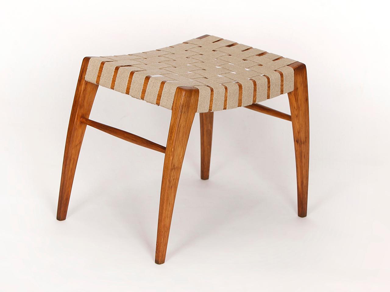 This stool was designed and executed by Krásná Jizba in the 1940s in former Czechoslovakia. It is made of oak with a woven hemp strap seat. Completely restored.
We offer shop to door delivery worldwide in special transport boxes.