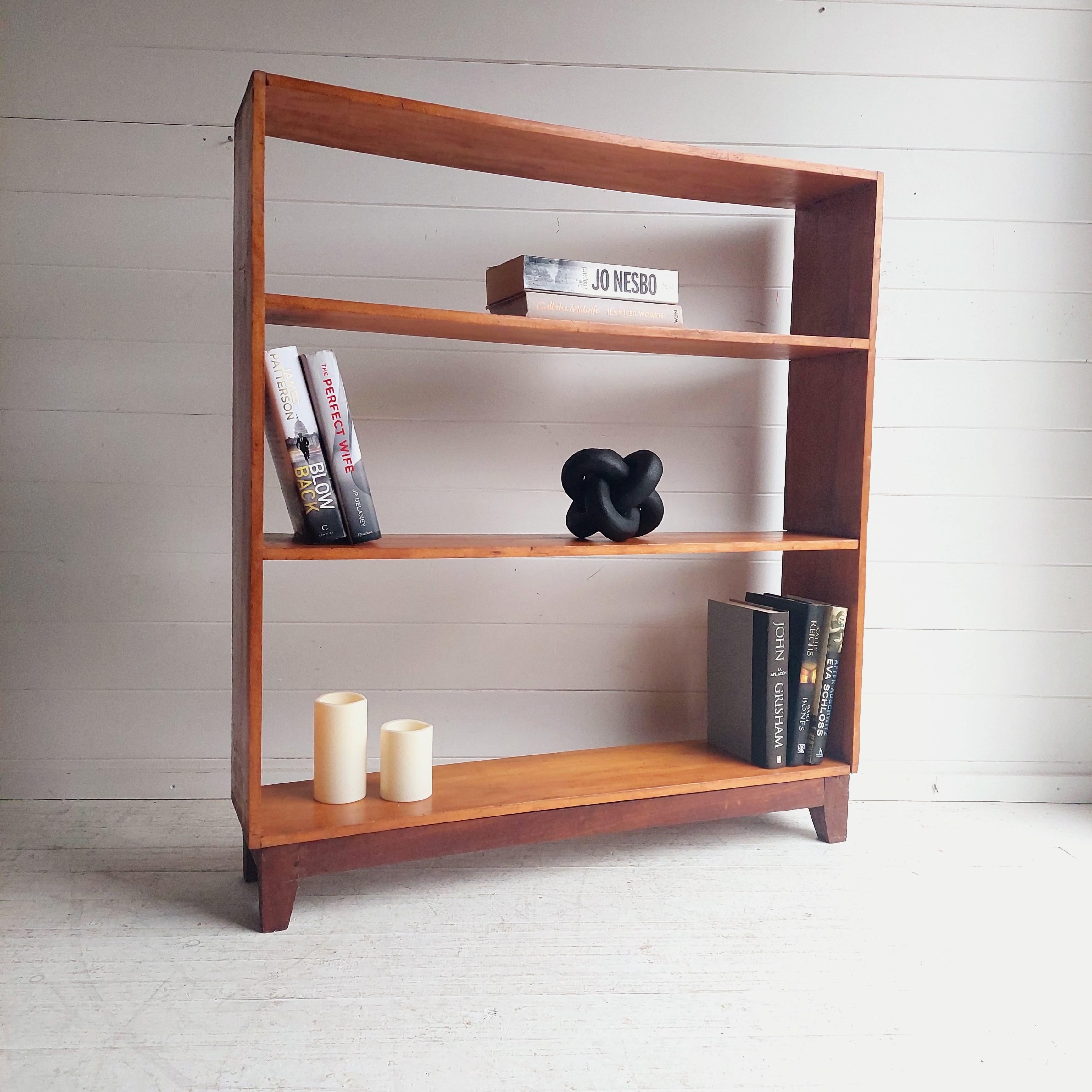 1940-50's  Teak Bookcase.
A handmade and probably unique piece.

Finished in solid teak the piece has a slightly distressed look and an aged patina. 
The design is typically Mid Century with a clean lines and visible finger joints in all 4 corners