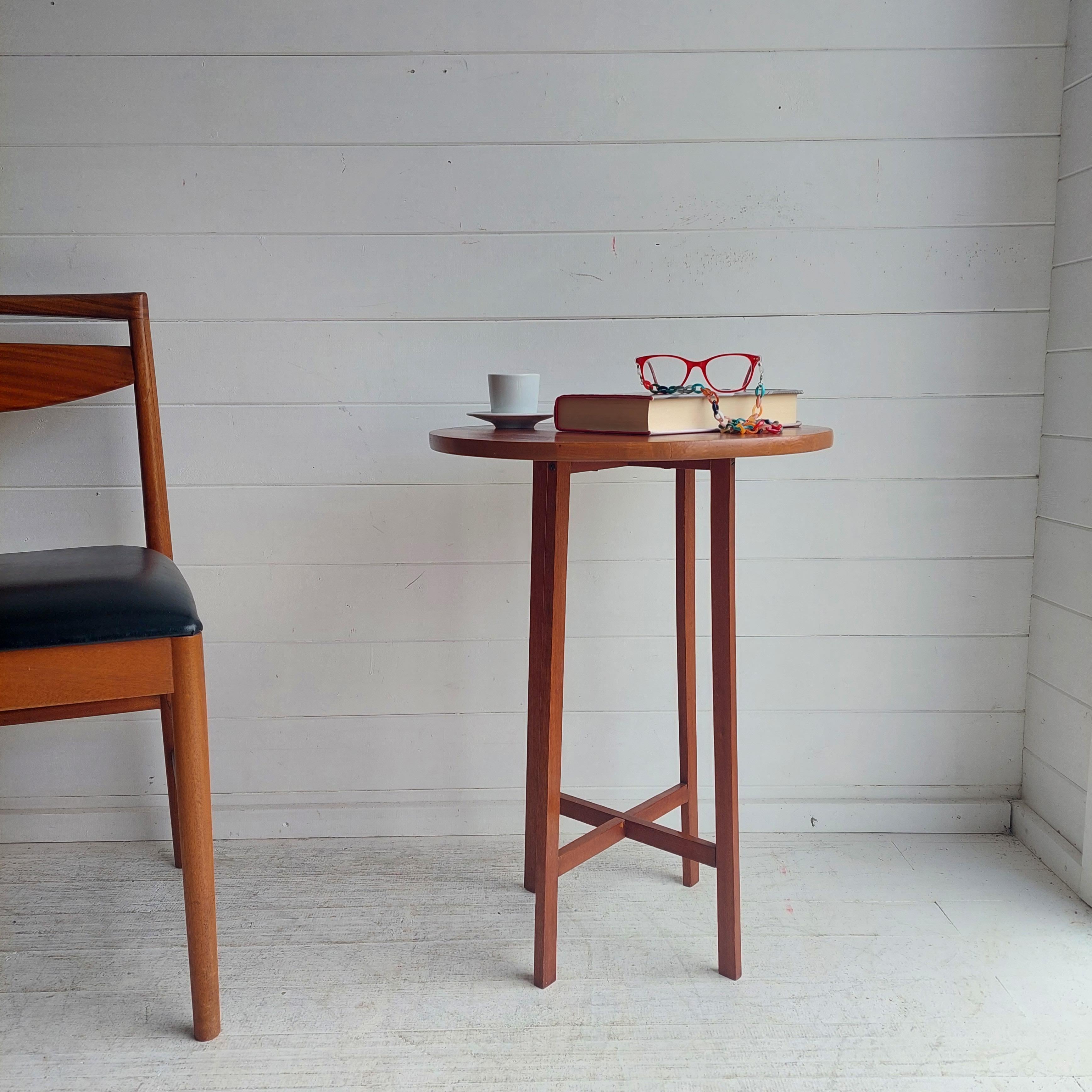 Mid Century teak side table from the 1960s
Beautiful round Danish style side table in teak.

In the manner of Poul Hundevad  nest of tables, but bigger and not foldable.
A cute light mid-century style side table
Tall, sleek and light in sight.

Teak