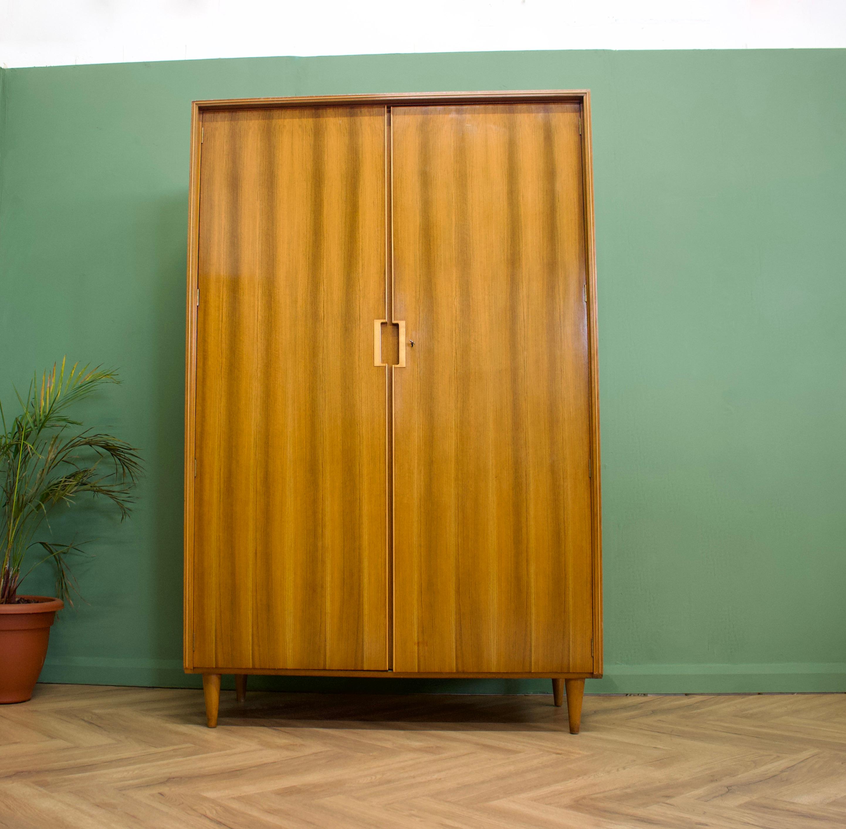 A walnut wardrobe from Bath Cabinet Makers
Featuring hanging rail the full width.