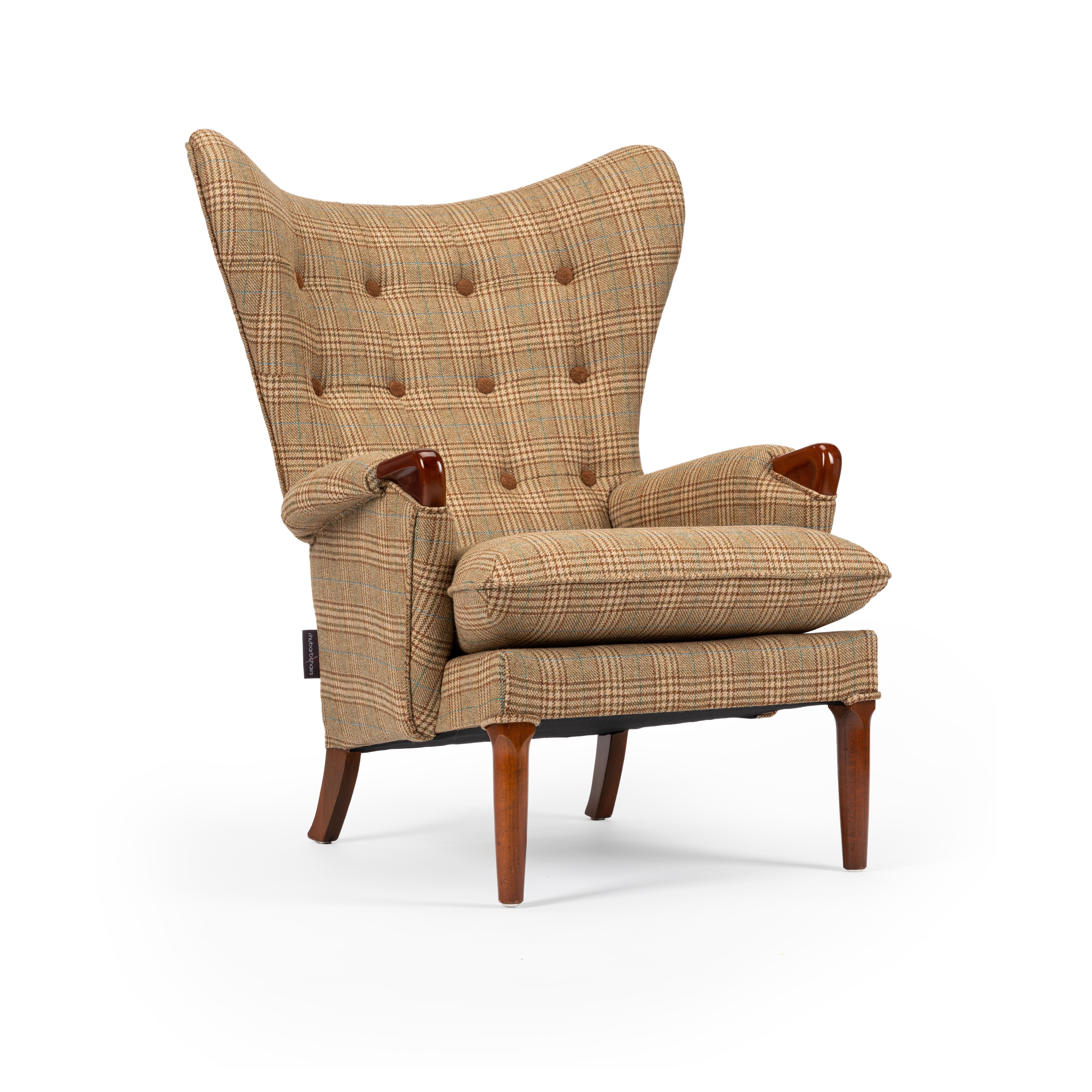 Midcentury vintage wingback chairs reupholstered in Yorkshire Tweed, circa 1960s

Stunning matching pair of Mid-Century Modern oversized 'wraparound' vintage 1960s wing chairs reupholstered in a peat and moss colored 100% wool Yorkshire Tweed with