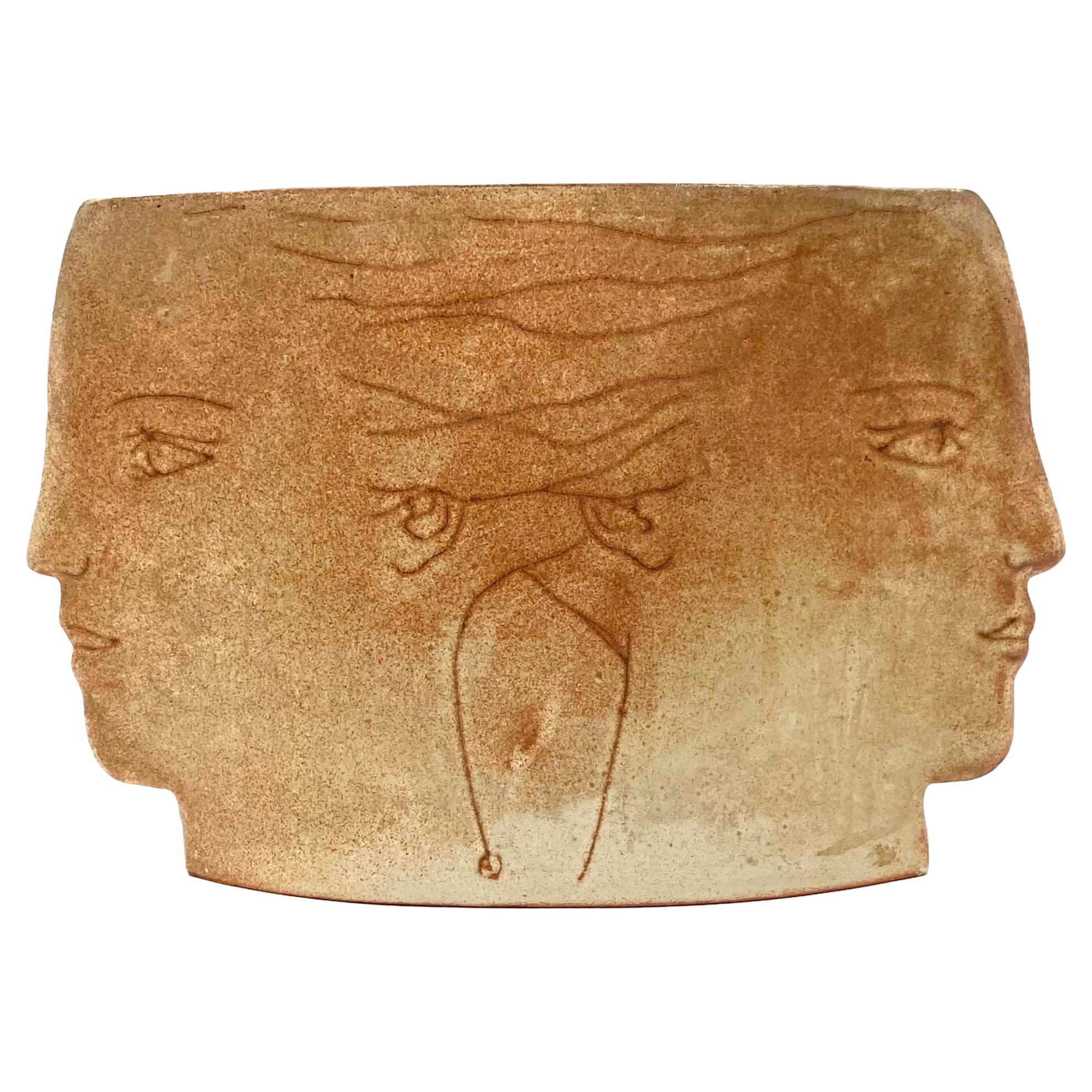 Mid-century 'visages' ceramic vase, France ca. 1960