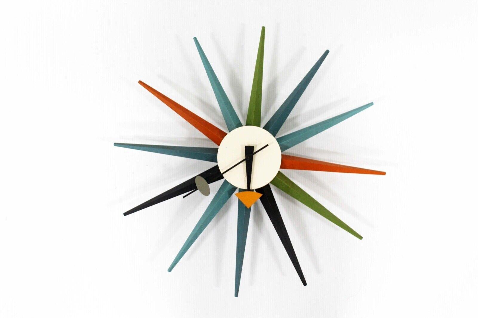 For your consideration is this iconic Mid-Century Modern Vitra Design Museum George Nelson sunburst wall clock. Measures: 19