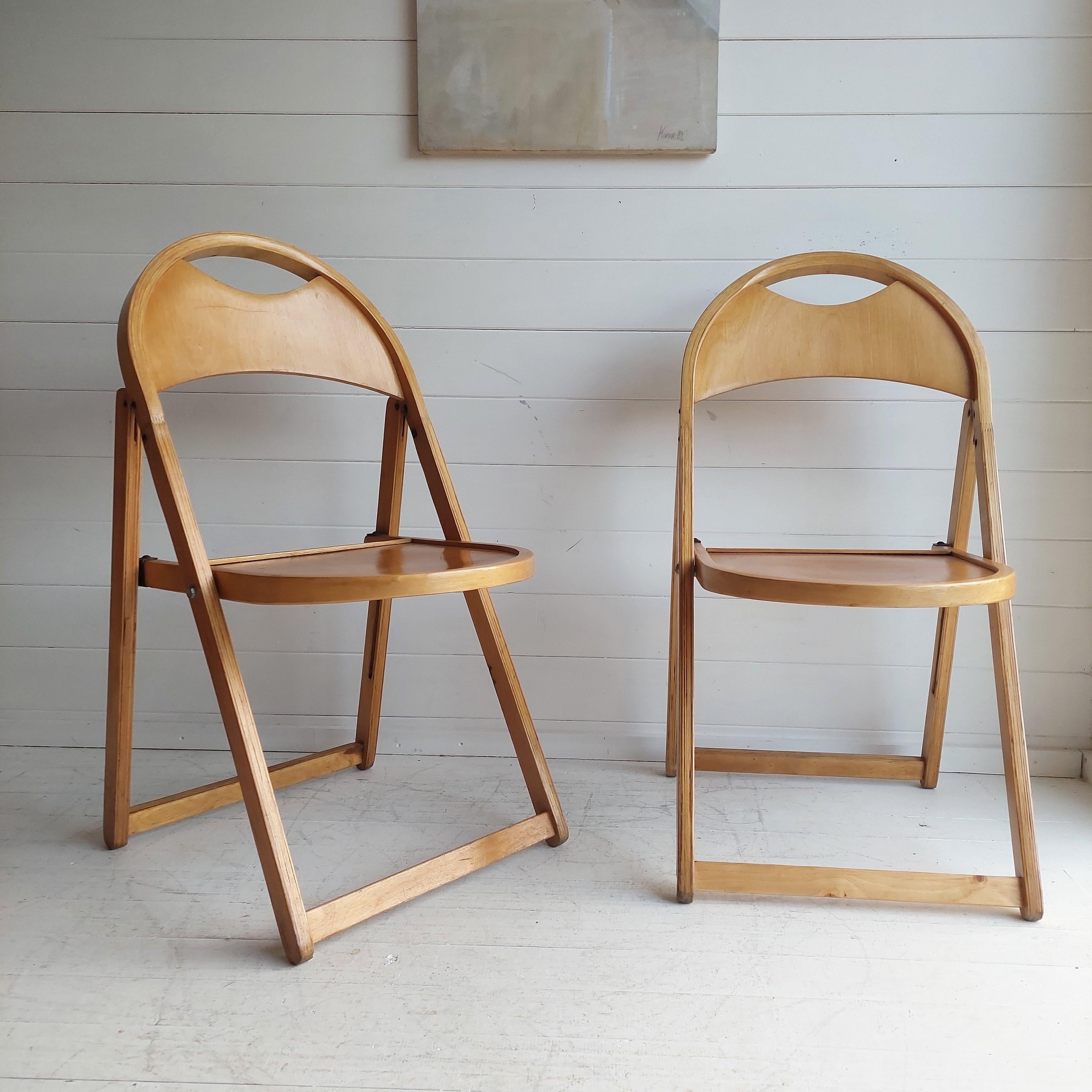 1950s folding chair for OTK set/2. Good condition consistent with age and use.
Mid-Century folding chairs.
Designer: Michael Thonet
Model: B-751
Stamped with quality control OTK 23

Old bistro French chairs OTK 1950
Beech curved