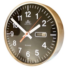 Wanduhr aus der Mitte des Jahrhunderts mit Datumsanzeige Meister-Anker Schwarz-Weiß, Deutschland