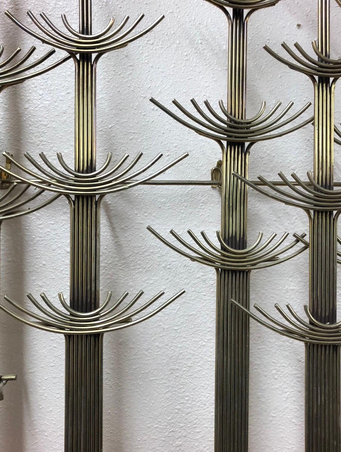 Mid-Century Modern brutalist style metal or brass wall art

Signed: C. Jere
Dated 1977

About 54”W x 46”H 
Sits about 5” out from the wall.