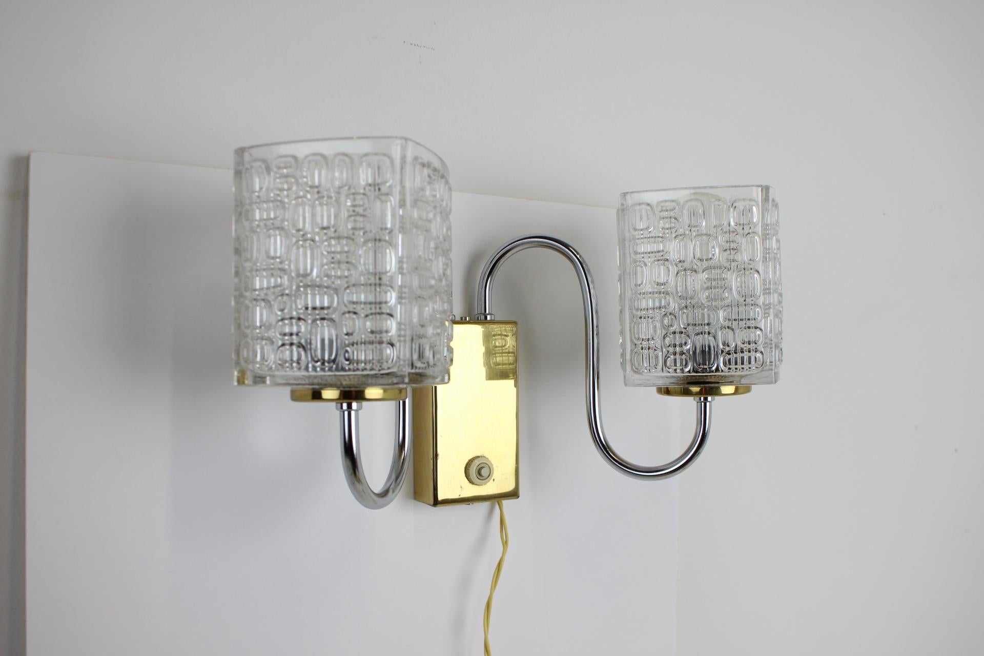 Made in Czechoslovakia
Made of glass, chrome, brass
New wiring was installed
With aged patina
2xE27 or E26 bulb
Original condition
US wiring compatible.